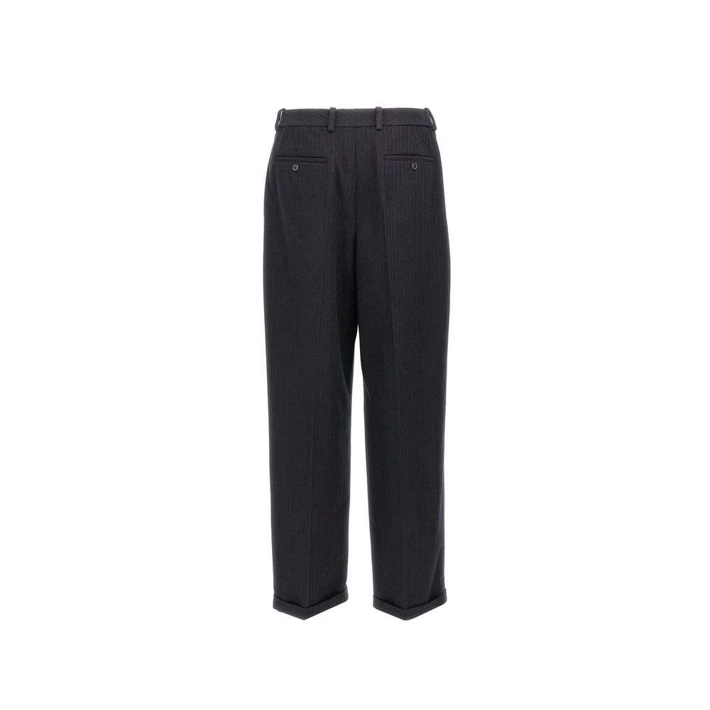 Elevate your wardrobe with Saint Laurent Black Cashmere Casual Pants, a fusion of 10% cashmere and 90% virgin wool, epitomizing luxury and sophistication.