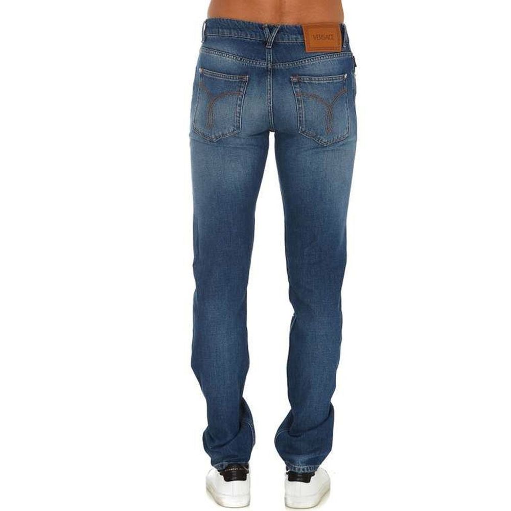 Elevate your wardrobe with Versace Blue Cotton Straight-Leg Jeans, a timeless piece crafted in Italy, embodying luxury and sophistication for the discerning individual.