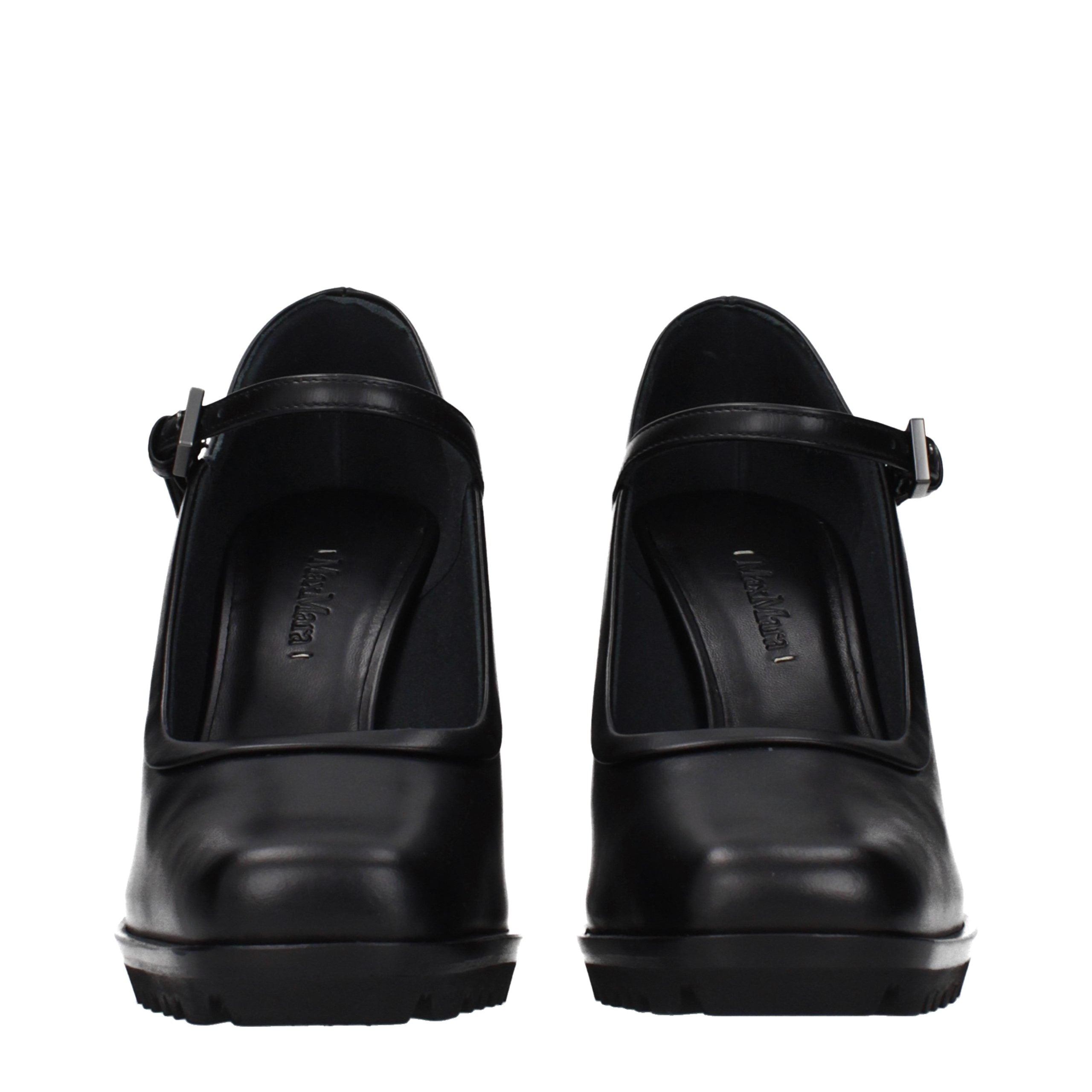 Indulge in the Max Mara Black Leather High Heel Pumps, where exquisite craftsmanship and timeless elegance elevate your style to new heights of sophistication.