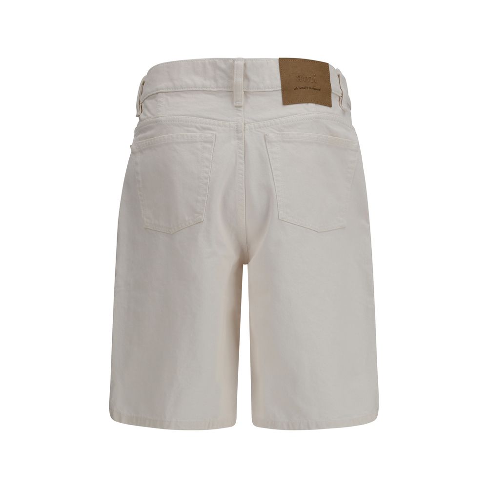 Elevate your wardrobe with Ami Paris White Cotton Bermuda Shorts, where artisanal luxury meets timeless sophistication in a refined silhouette crafted from premium cotton.