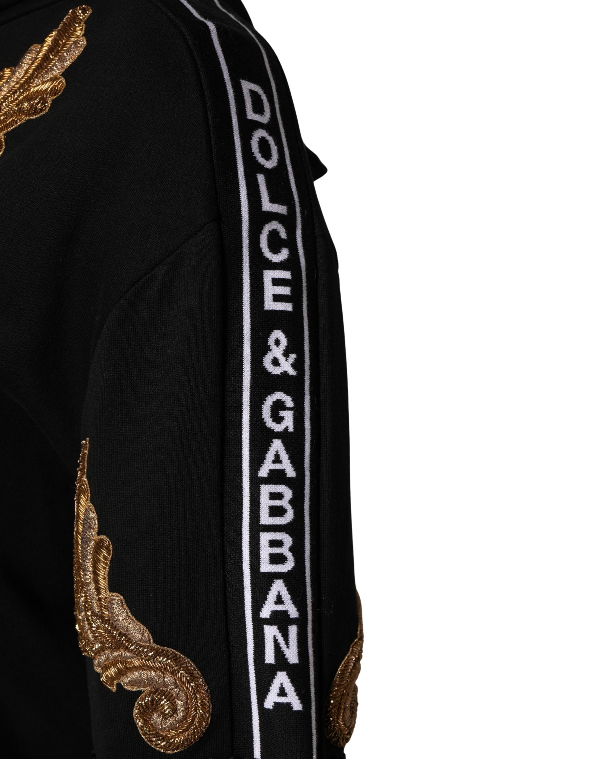 Experience the allure of Dolce & Gabbana's Black Embroidered Tassel Hooded Sweatshirt, where exquisite craftsmanship meets luxurious materials for a statement of elegance.