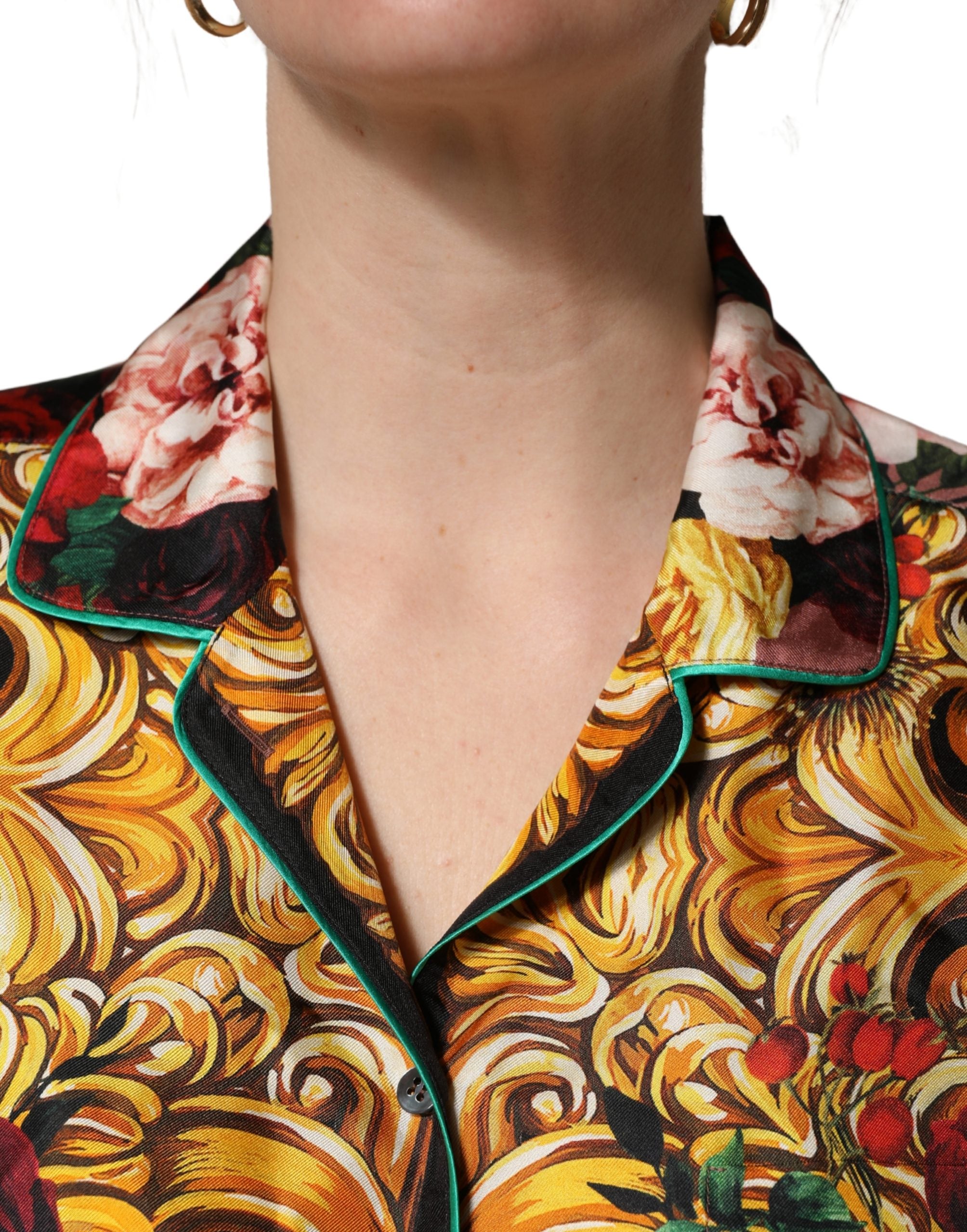 Elevate your wardrobe with Dolce & Gabbana's exquisite floral silk shirt, a timeless piece that embodies elegance and sophistication for the discerning individual.