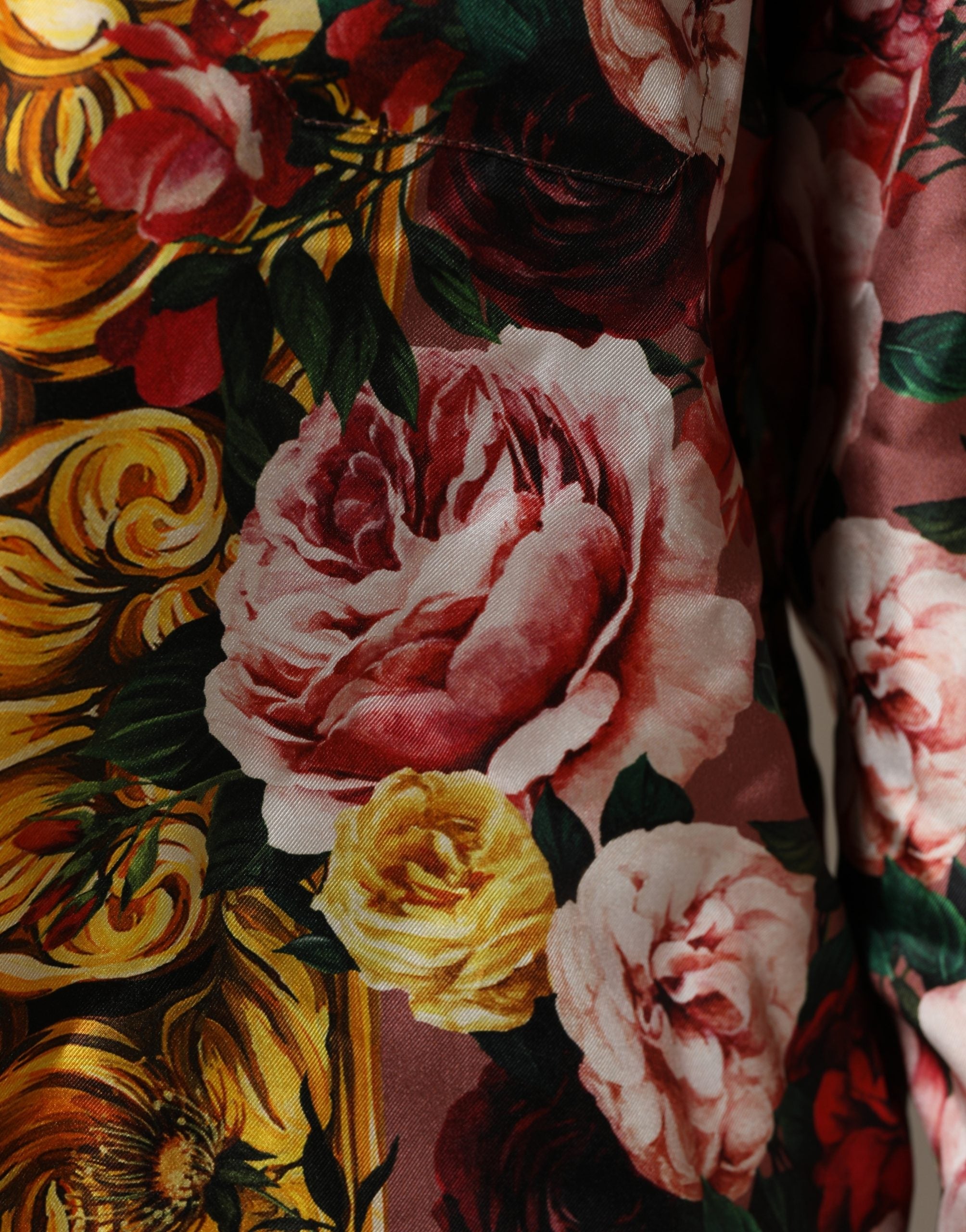 Elevate your wardrobe with the exquisite Dolce & Gabbana Multicolor Floral Silk Button Down Shirt, a luxurious blend of artistry and sophistication, perfect for any occasion.