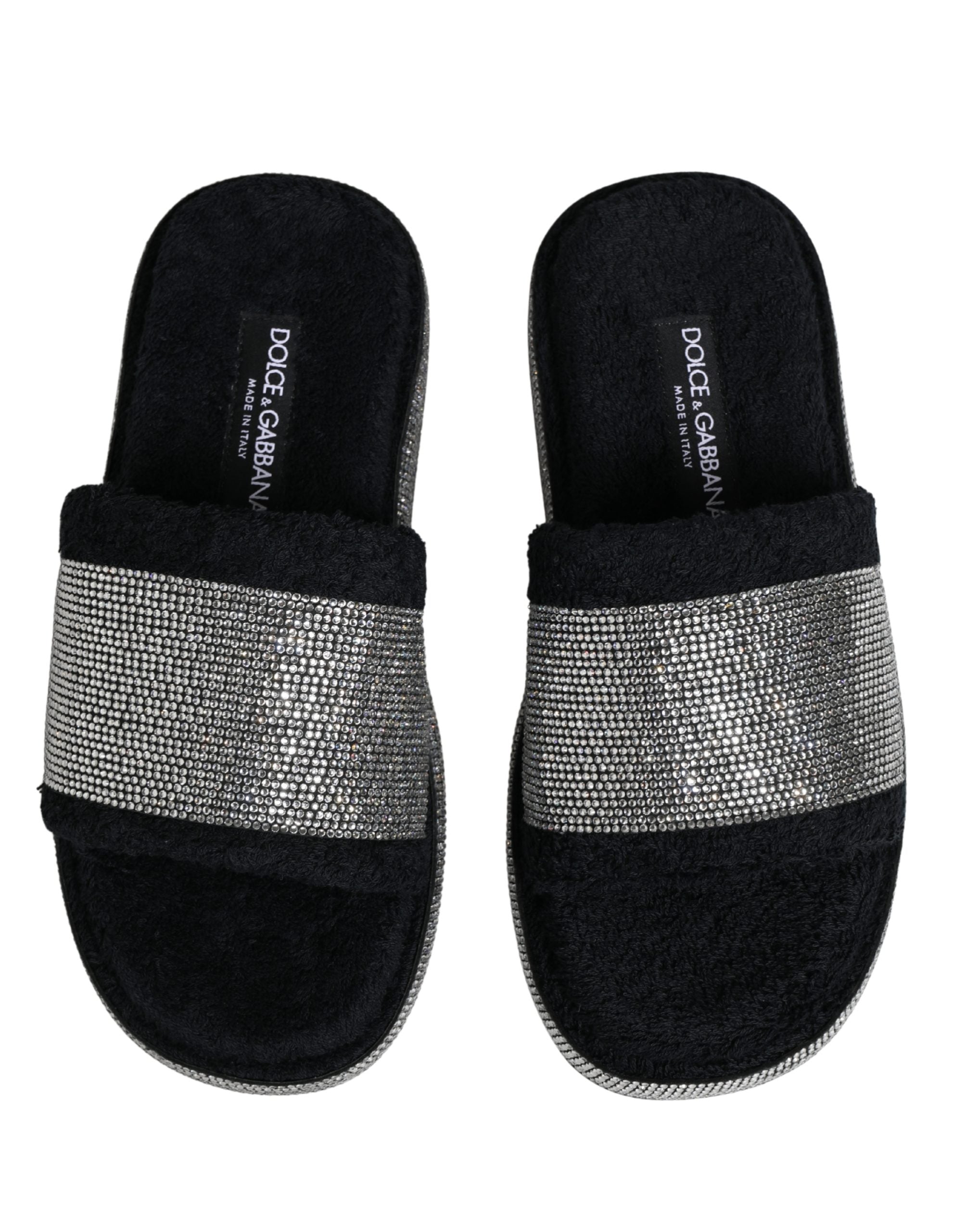 Elevate your style with Dolce & Gabbana's black crystal-embellished platform slides, a luxurious blend of comfort and opulence, crafted in Italy for the discerning individual.