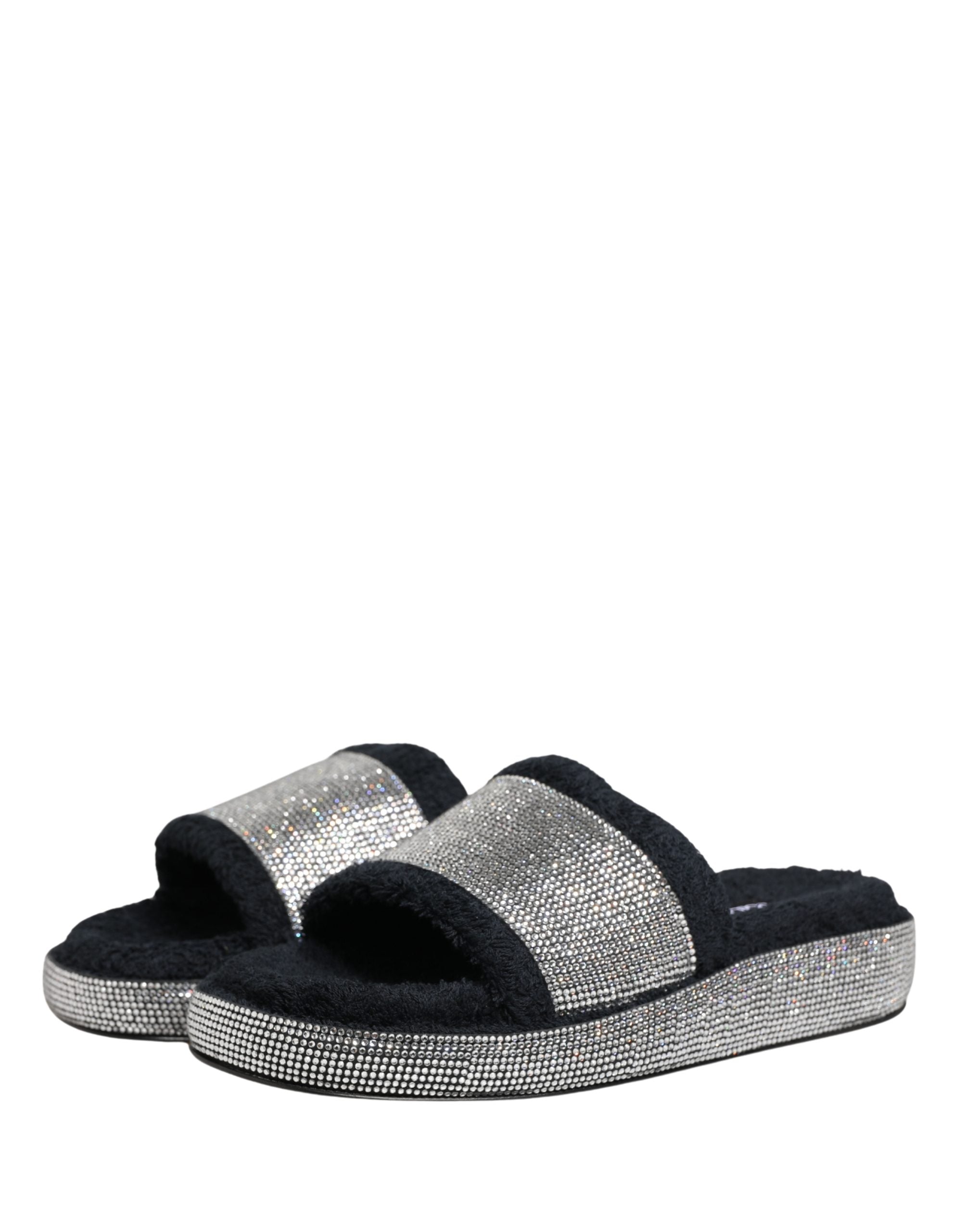 Elevate your style with Dolce & Gabbana's black crystal-embellished platform slides, where Italian craftsmanship meets luxurious comfort for the discerning individual.