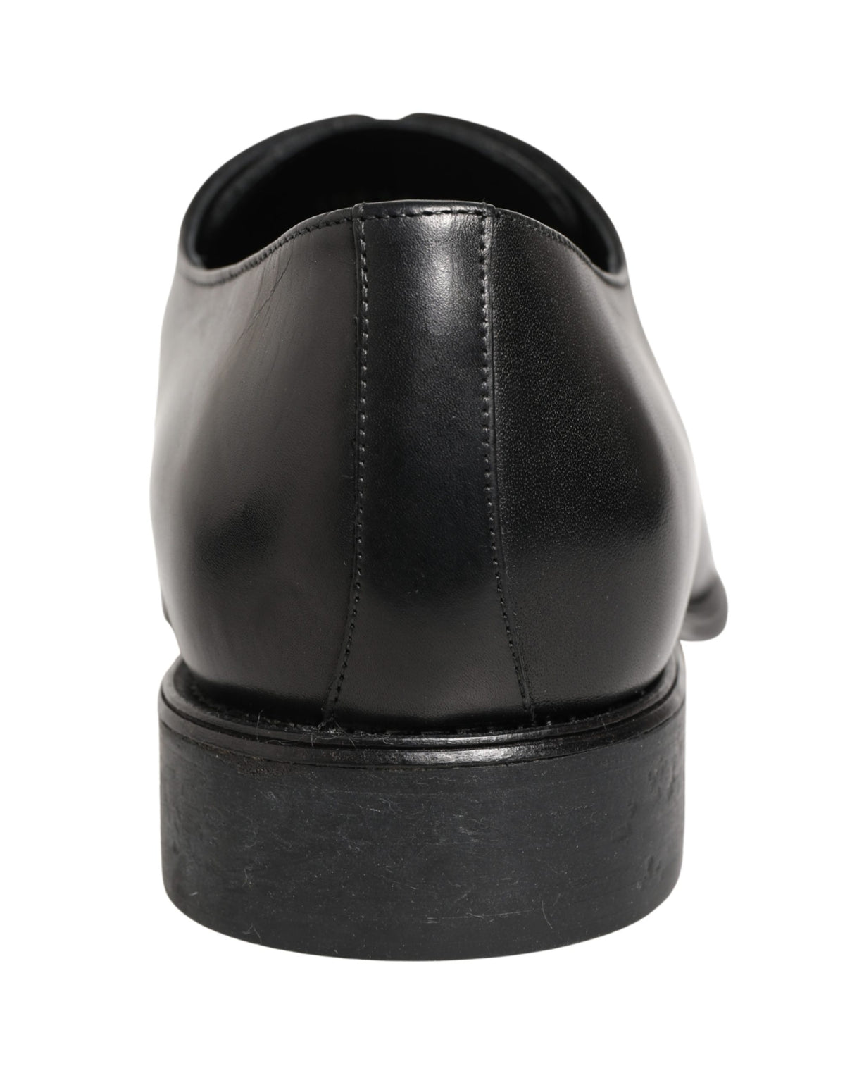 Indulge in the exquisite craftsmanship of Dolce & Gabbana's Black Calfskin Leather Derby Shoes, where timeless elegance meets modern sophistication for the discerning individual.