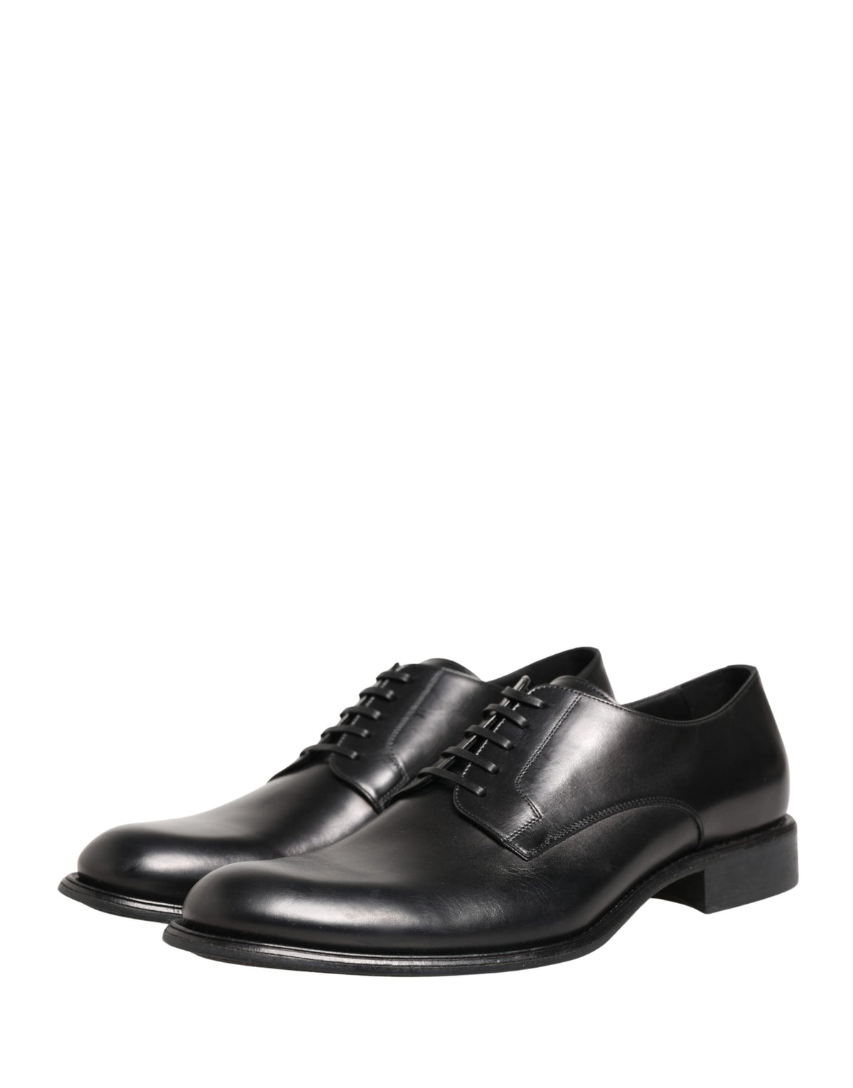 Indulge in the exquisite craftsmanship of Dolce & Gabbana's Black Calfskin Leather Derby Shoes, where timeless elegance meets modern sophistication for the discerning individual.