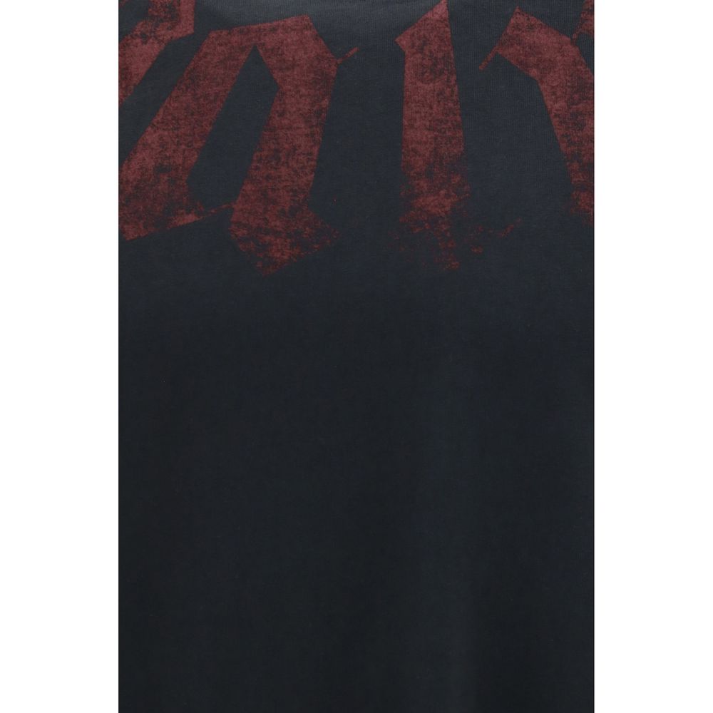 Discover the Palm Angels Black Cotton T-Shirt, a luxurious blend of comfort and style, featuring a distressed logo that embodies modern elegance for the discerning individual.