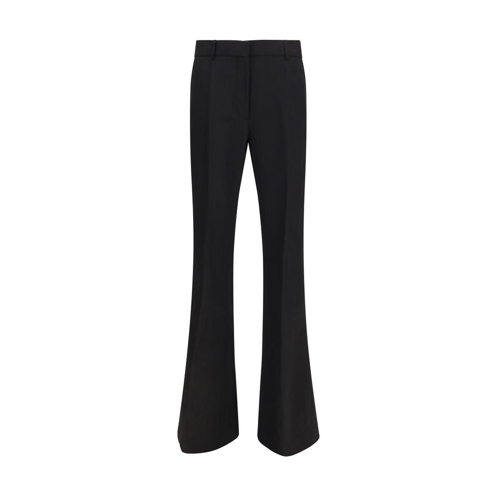 Indulge in the Max Mara Black Viscose Flared Pants, a masterpiece of exquisite craftsmanship and modern elegance, perfect for elevating any sophisticated wardrobe.