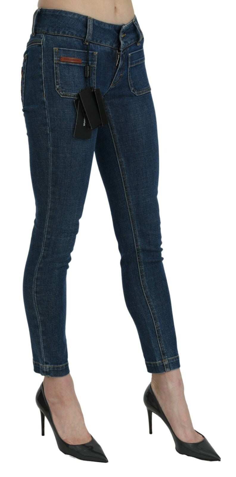 Indulge in the exquisite Dolce & Gabbana Blue Slim Fit Cropped Mid Waist Denim Jeans, crafted in Italy from premium cotton blend, a statement of refined luxury and effortless elegance.
