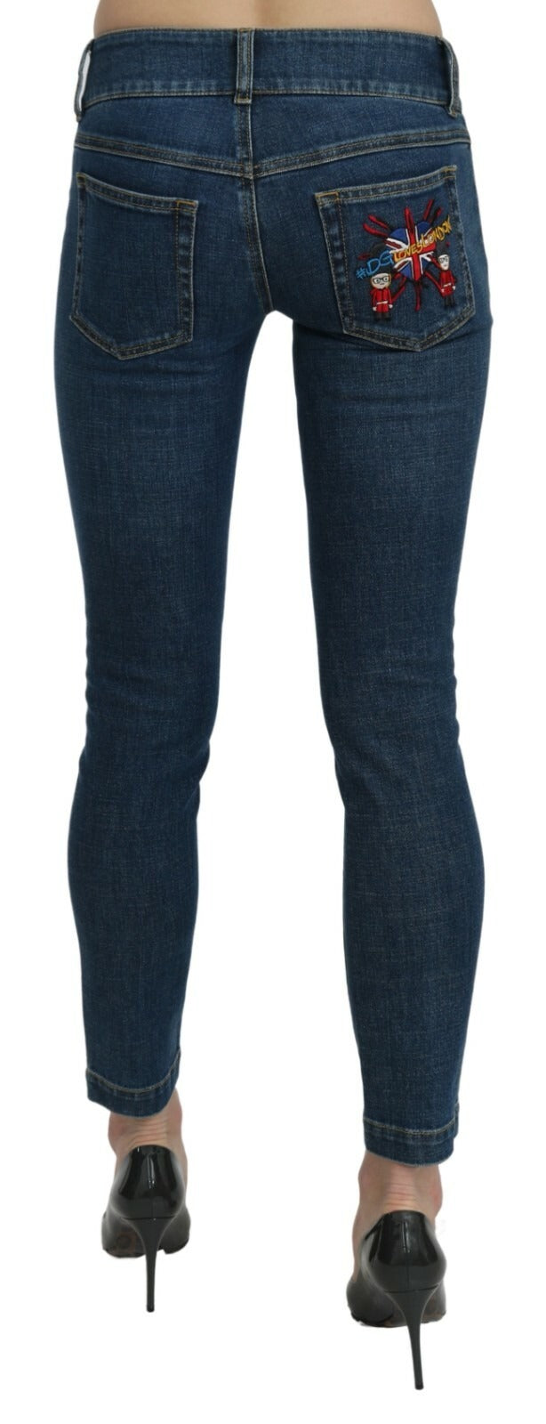 Indulge in the exquisite allure of Dolce & Gabbana's Blue Slim Fit Cropped Mid Waist Denim Jeans, crafted from premium materials for a timeless, luxurious statement.