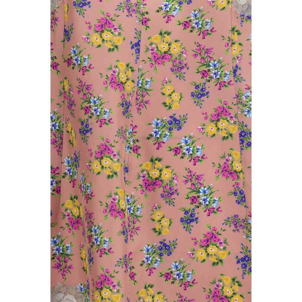 Discover the Dolce & Gabbana Multicolor Silk Casual Dress, a masterpiece of floral elegance crafted from luxurious silk and lace, perfect for sophisticated occasions.