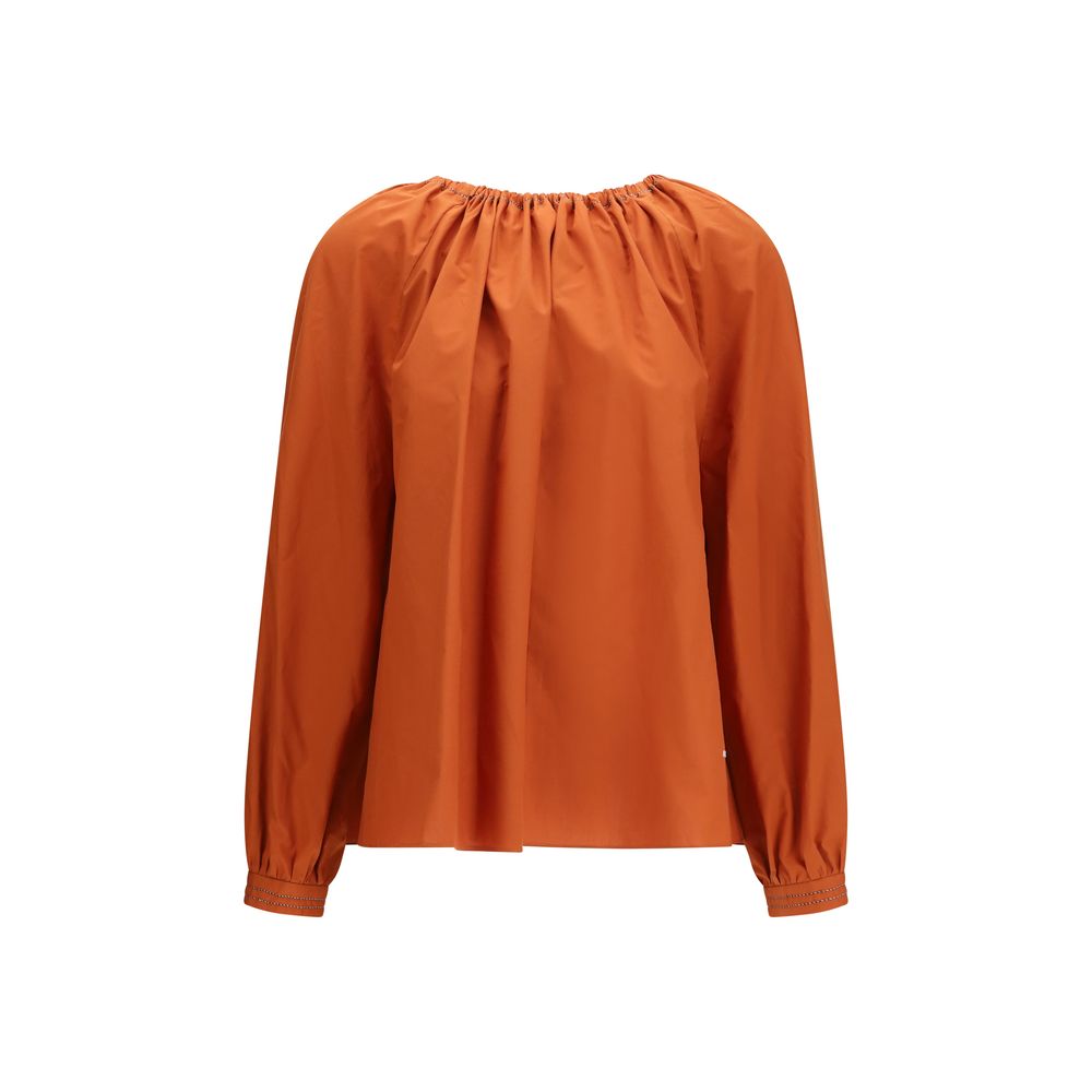 Discover the Marni Orange Cotton Blouse, a masterpiece of artisanal elegance in 100% cotton, perfect for elevating your sophisticated style with effortless allure.