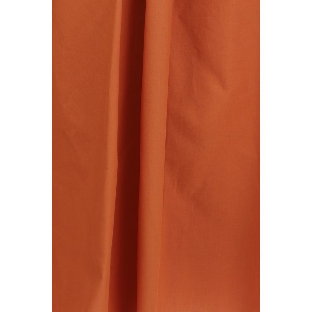 Experience the exquisite Marni Orange Cotton Blouse, crafted from 100% cotton, where artisanal elegance meets luxurious comfort for an elevated lifestyle.