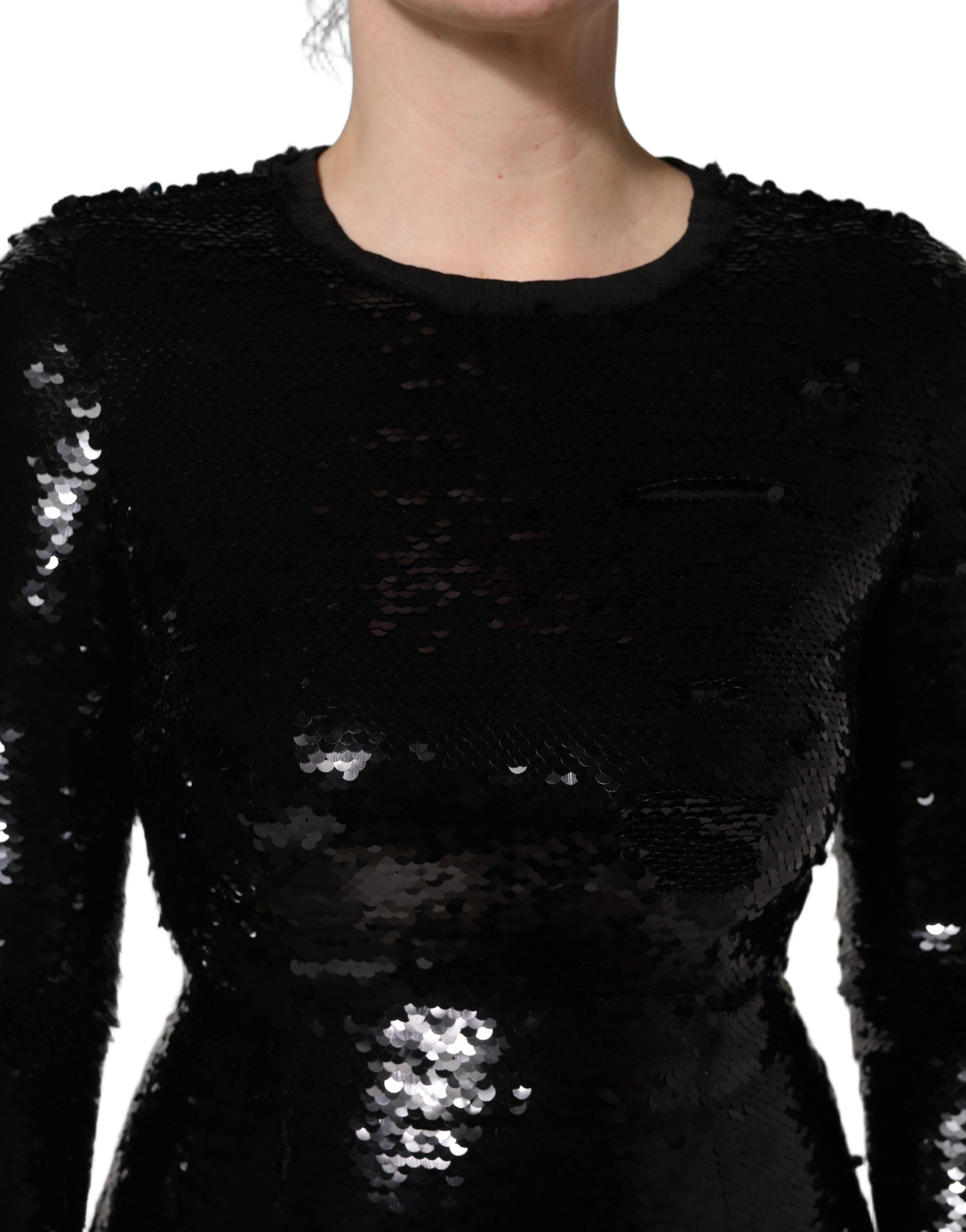 Experience the allure of the Dolce & Gabbana black bodycon mermaid sequinned gown, a testament to exquisite craftsmanship and timeless elegance for unforgettable evenings.