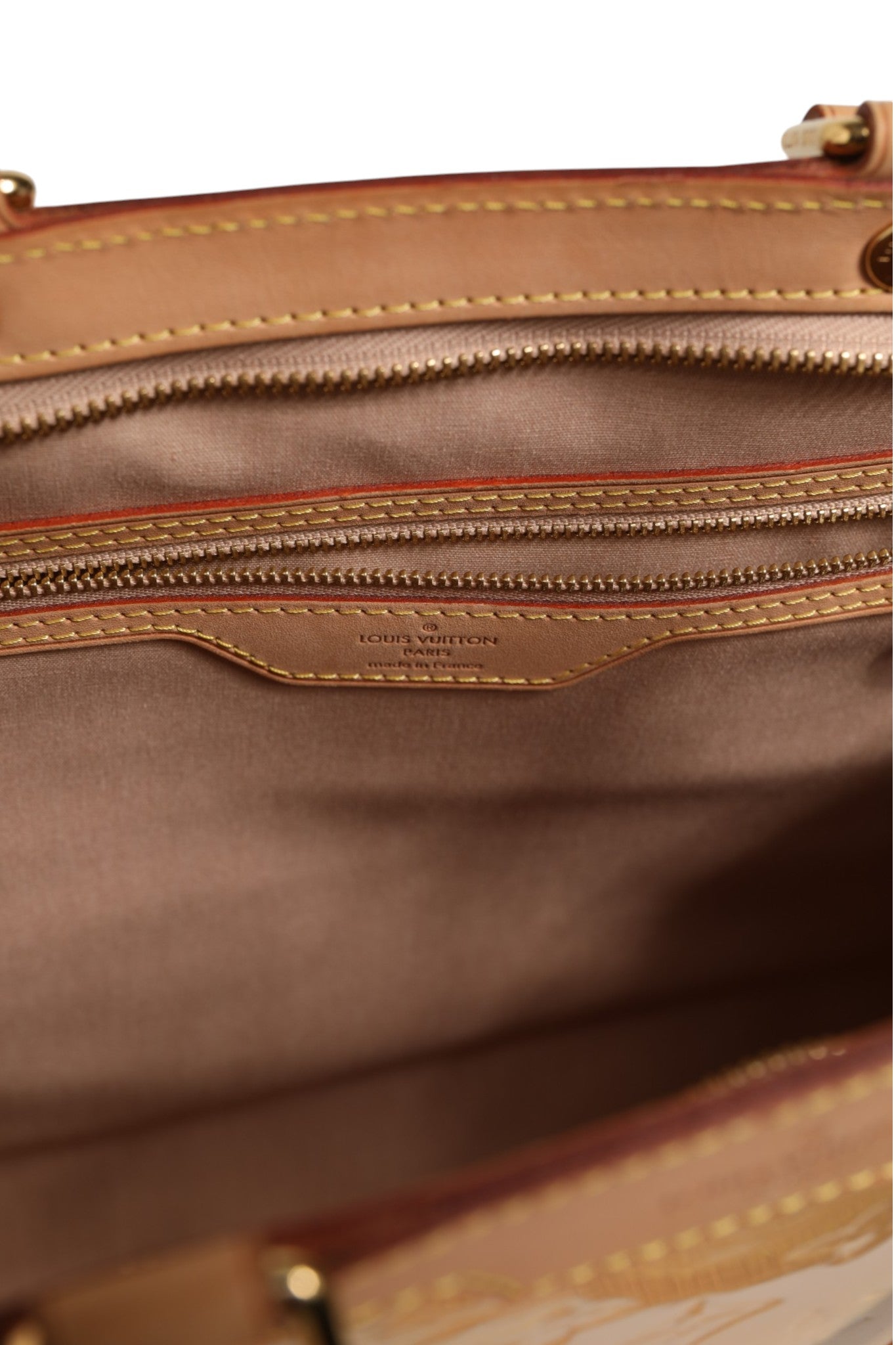 Discover the Louis Vuitton Monogram Vernis Brea MM in Beige Poudre, a timeless blend of exquisite craftsmanship and luxurious elegance, perfect for the discerning individual.