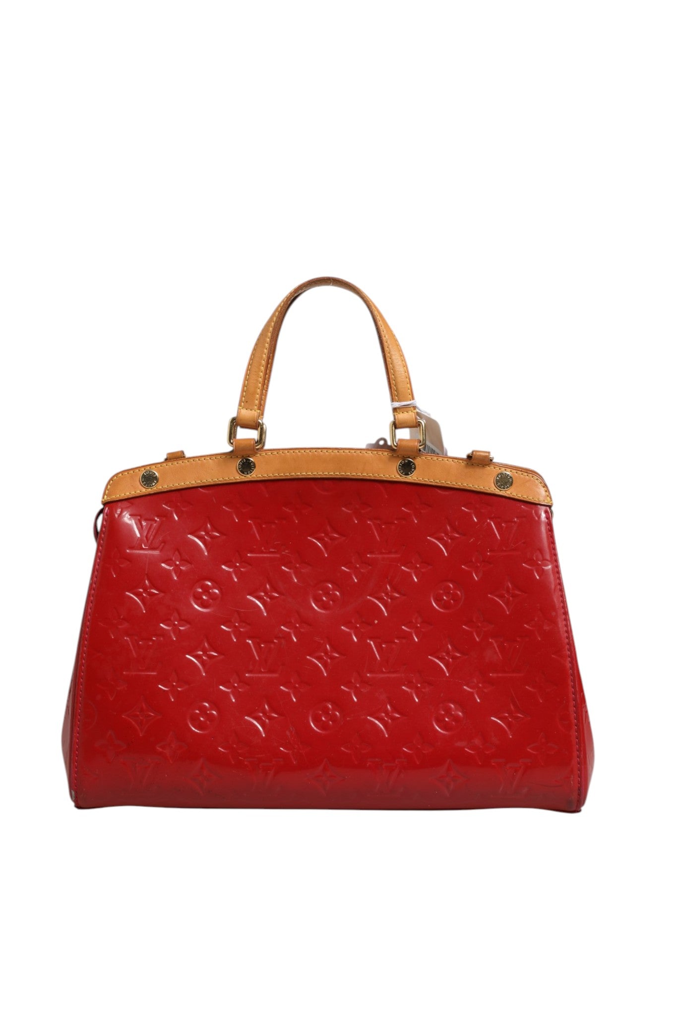 Indulge in the exquisite allure of the Louis Vuitton Brea MM Monogram Vernis, a luxurious red handbag that embodies sophistication and timeless elegance, perfect for discerning individuals.