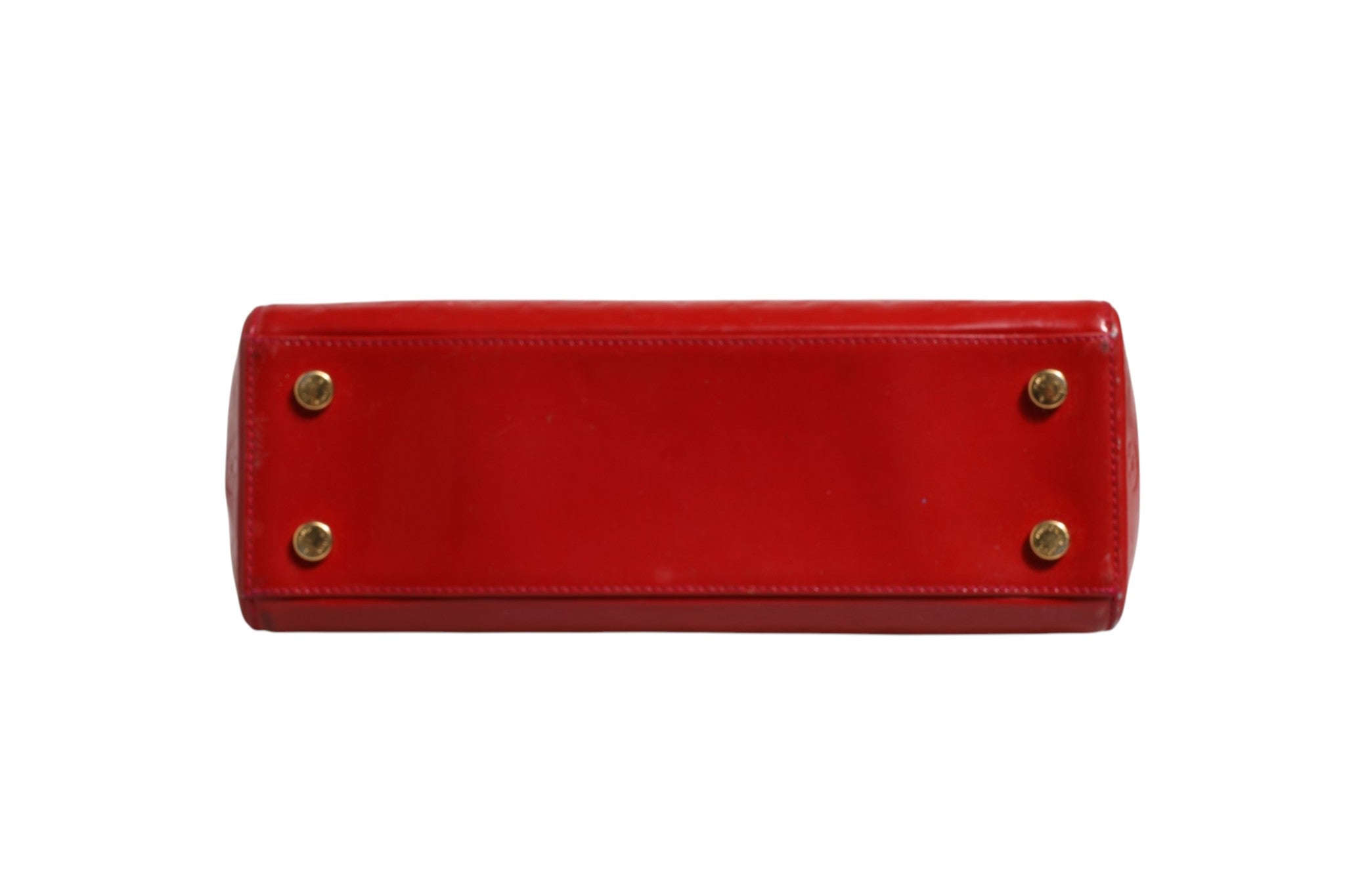 Discover the Louis Vuitton Brea MM Monogram Vernis, a striking red handbag that embodies elegance and sophistication, perfect for those who appreciate luxury.