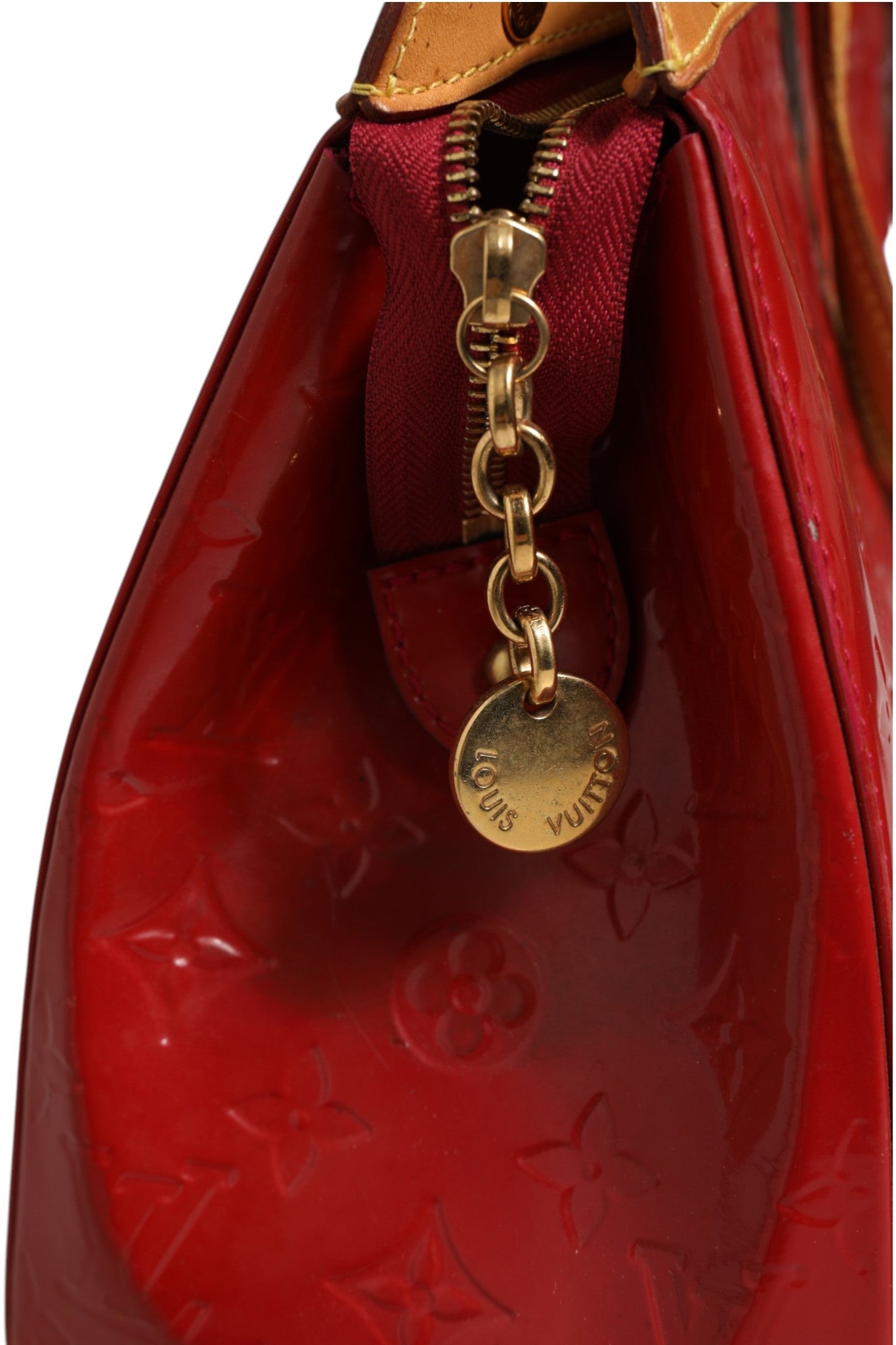 Indulge in the exquisite Louis Vuitton Brea MM Monogram Vernis, a symbol of luxury and sophistication, perfect for those who embrace elegance and timeless style.