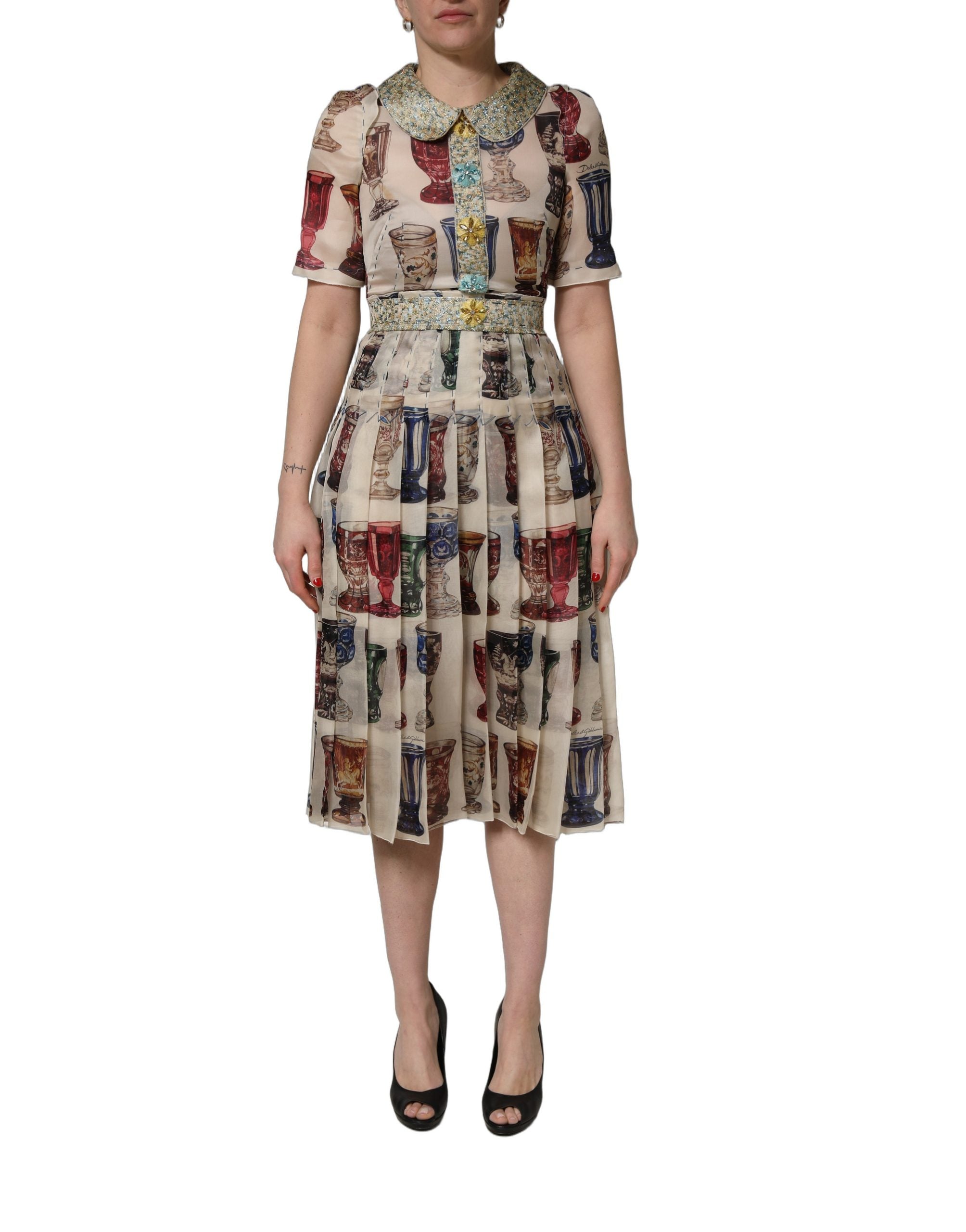 Discover the Dolce & Gabbana Multicolor Vintage Glassware Midi Dress, a masterpiece of silk craftsmanship that embodies timeless elegance and modern sophistication.