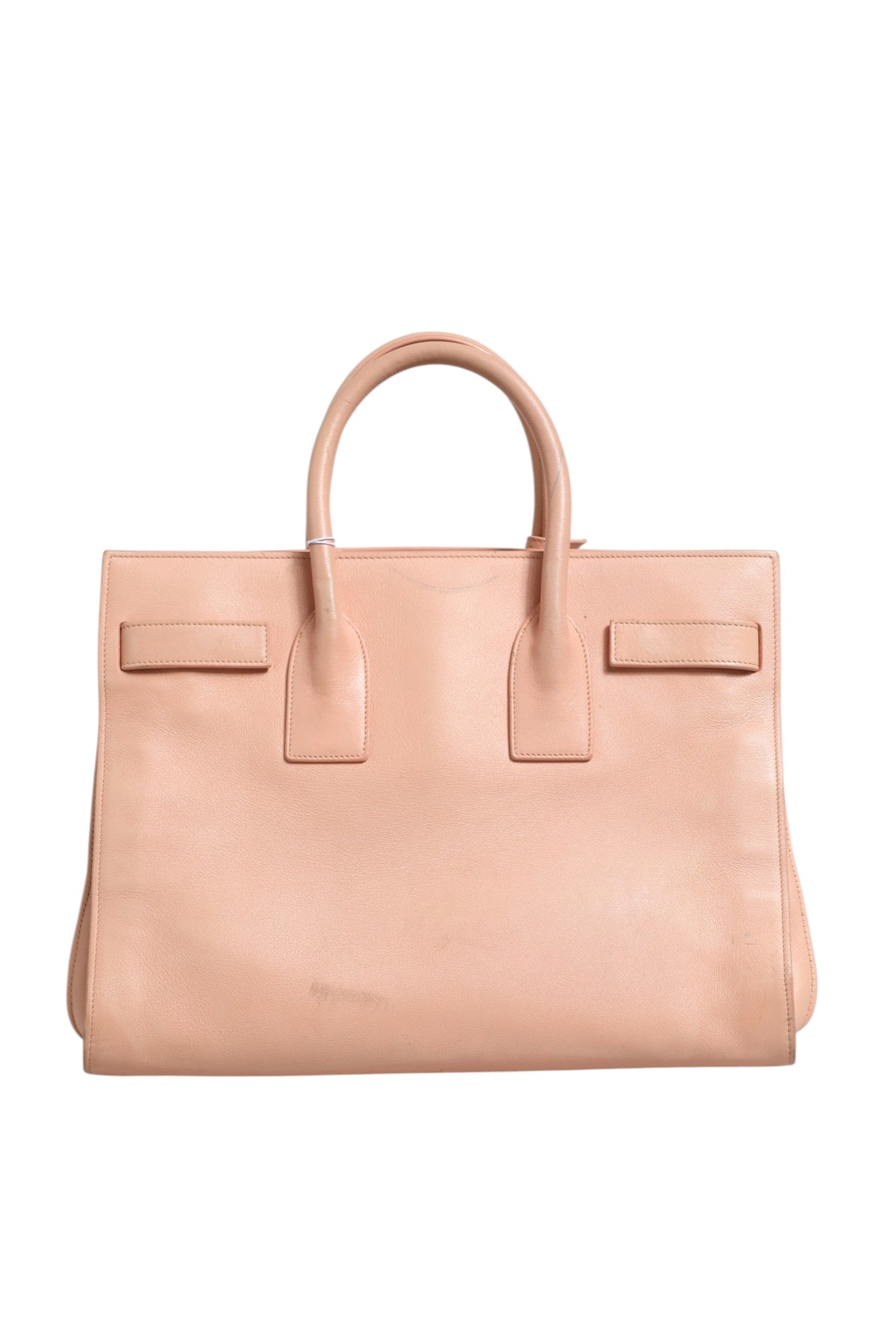 Discover the Saint Laurent Nano Sac De Jour, a pink masterpiece of exquisite craftsmanship that embodies luxury and sophistication for the discerning individual.