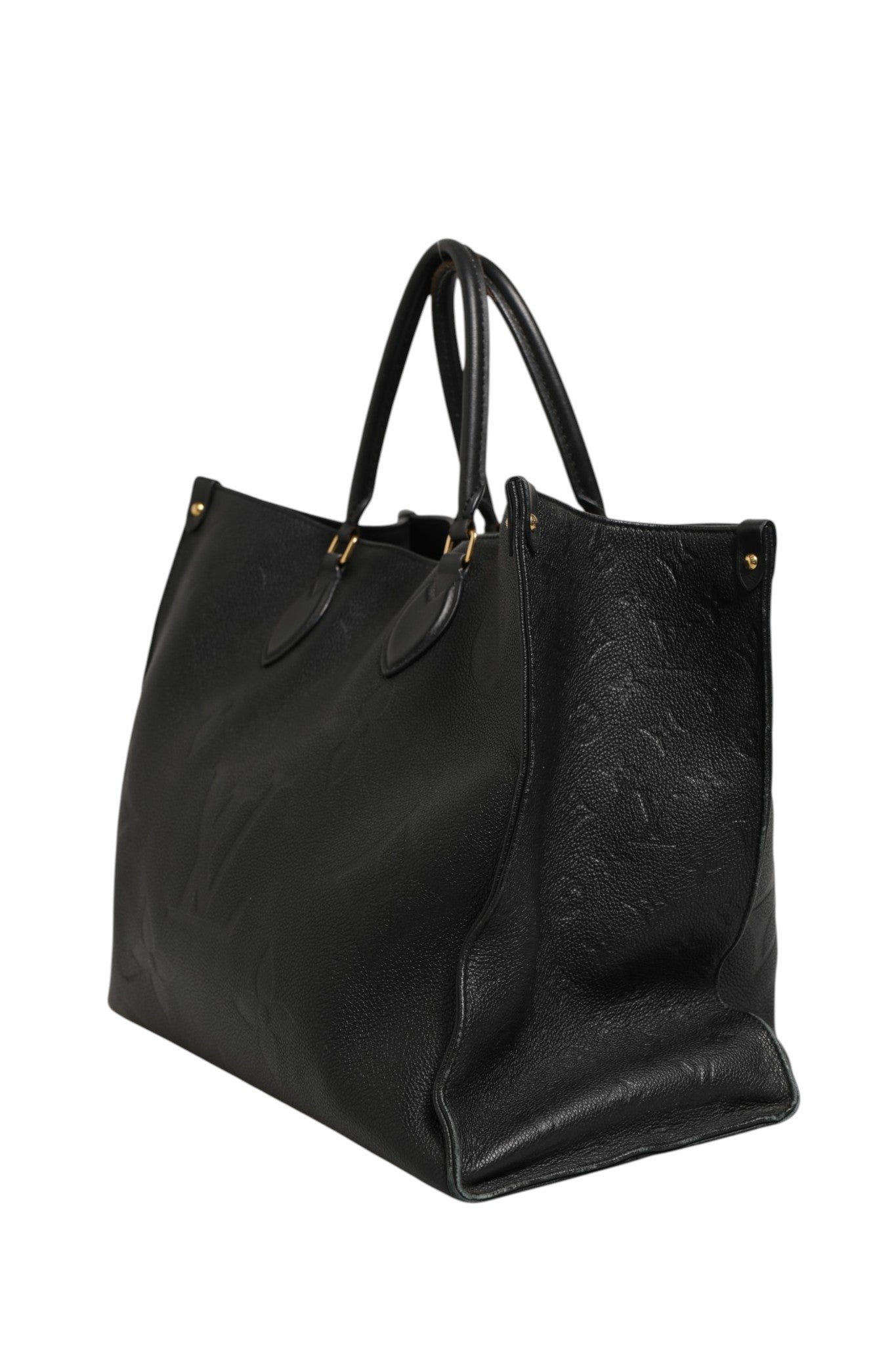 Discover the Louis Vuitton OnTheGo GM Monogram Empreinte Leather handbag, a timeless blend of luxury and elegance, crafted for those who command attention.