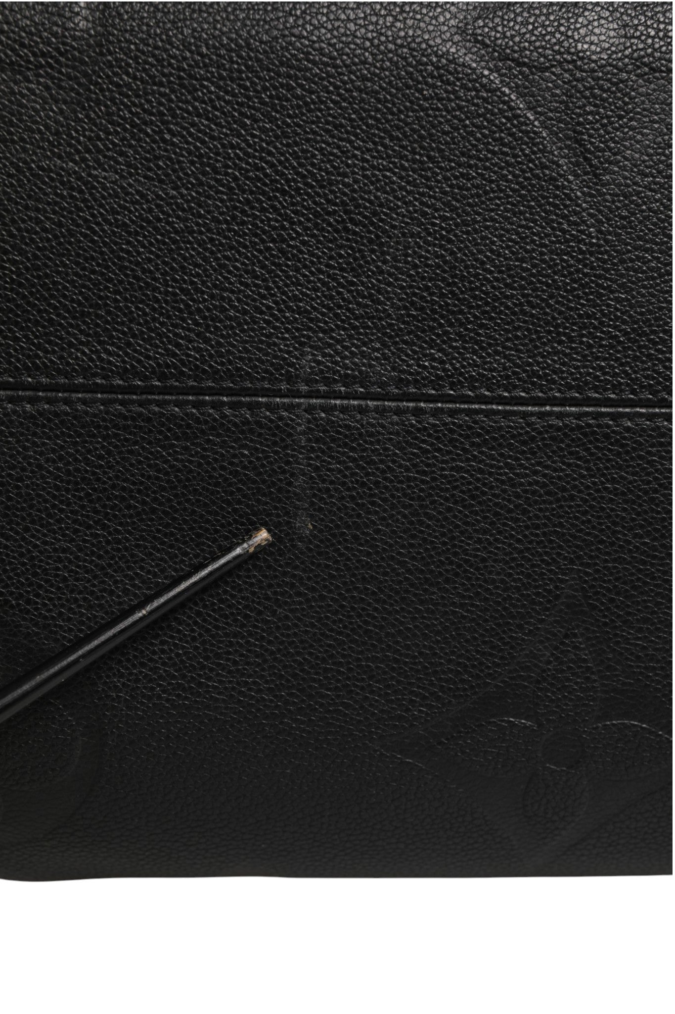 Discover the Louis Vuitton OnTheGo GM Monogram Empreinte Leather handbag, a masterpiece of luxurious craftsmanship that embodies elegance and sophistication for the discerning individual.