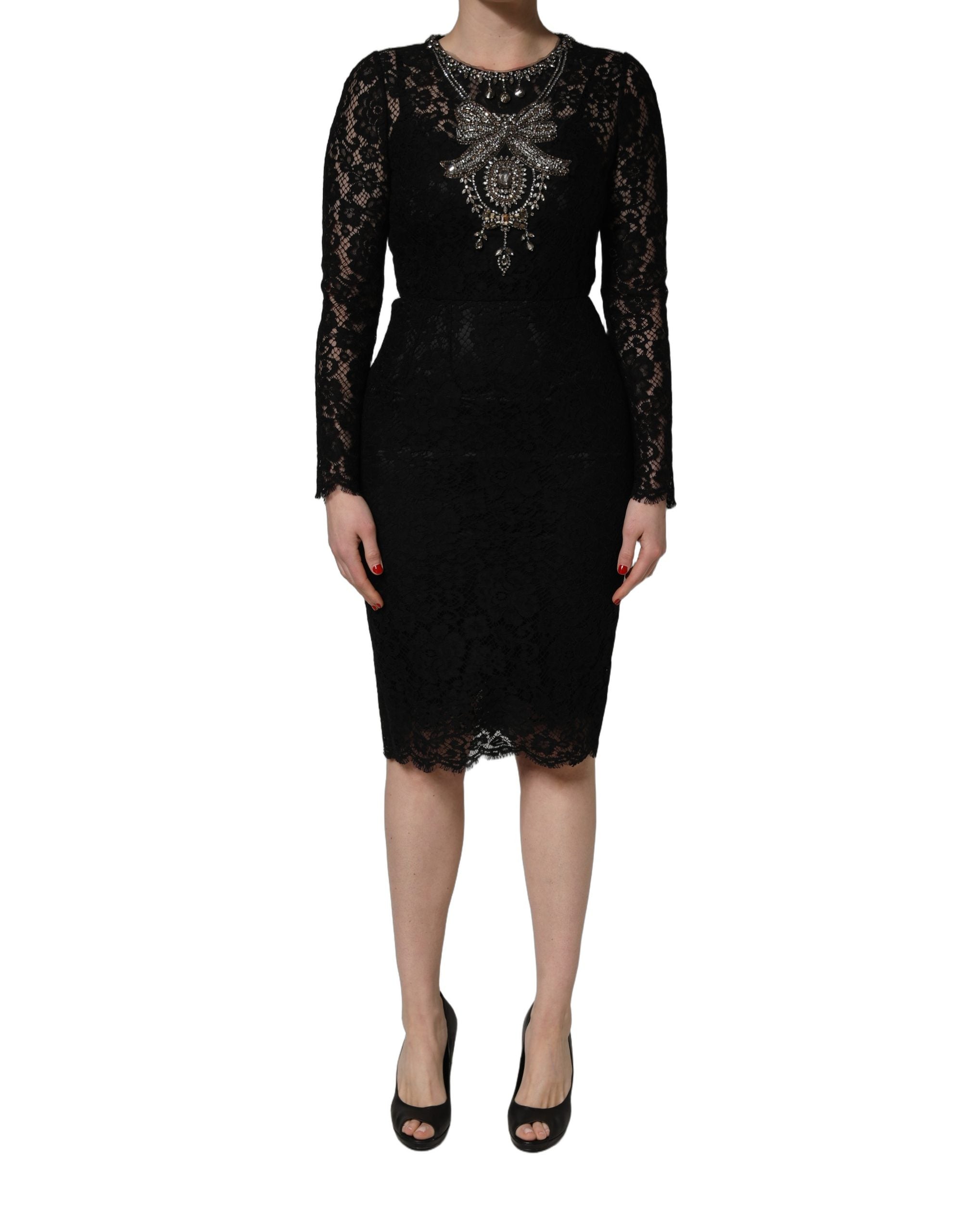 Experience the exquisite allure of Dolce & Gabbana's Black Crystal Embellished Sheath Midi Dress, a timeless masterpiece crafted from luxurious materials for the discerning individual.