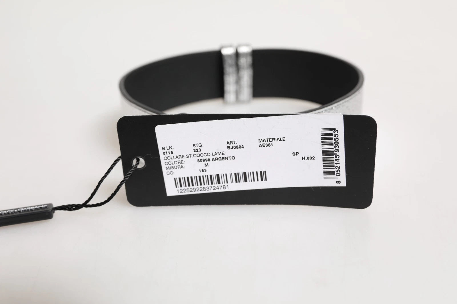 Indulge in the exquisite allure of the Dolce & Gabbana Silver Textured Leather Neckband, a luxurious statement piece that embodies Italian craftsmanship and timeless elegance.