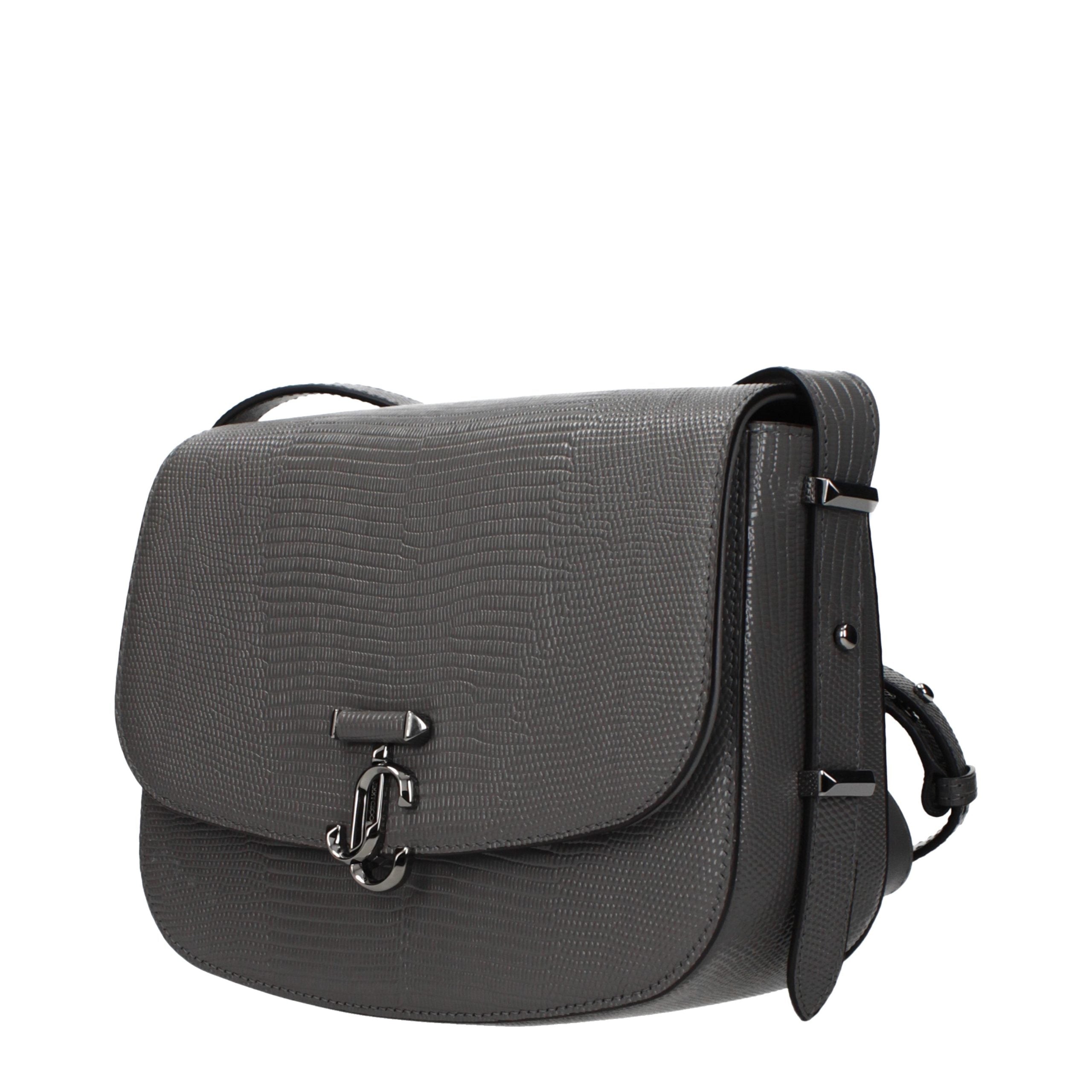 Elevate your style with the Jimmy Choo Gray Leather Crossbody Bag, a symbol of luxury and sophistication, crafted for the discerning individual who appreciates timeless elegance.