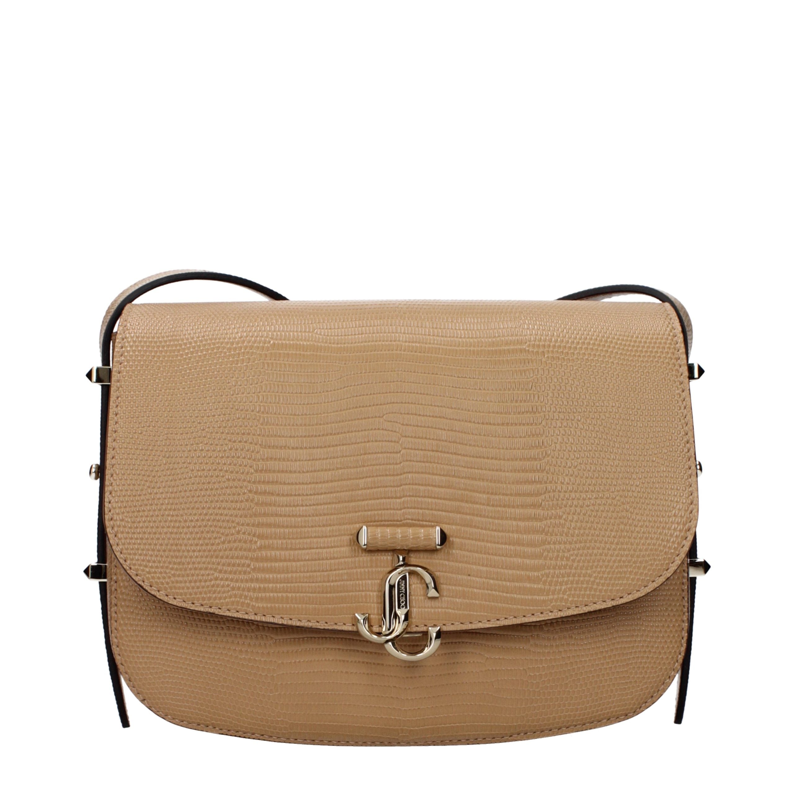Elevate your style with the Jimmy Choo Brown Leather Crossbody Bag, a masterpiece of artisan craftsmanship that embodies timeless elegance and sophisticated allure.