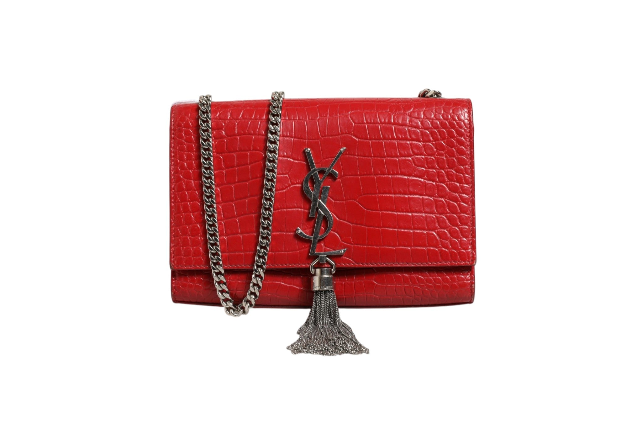 Indulge in the allure of the Saint Laurent Kate Tassel Chain Bag, crafted from exquisite red crocodile embossed leather, a timeless statement of luxury and sophistication.