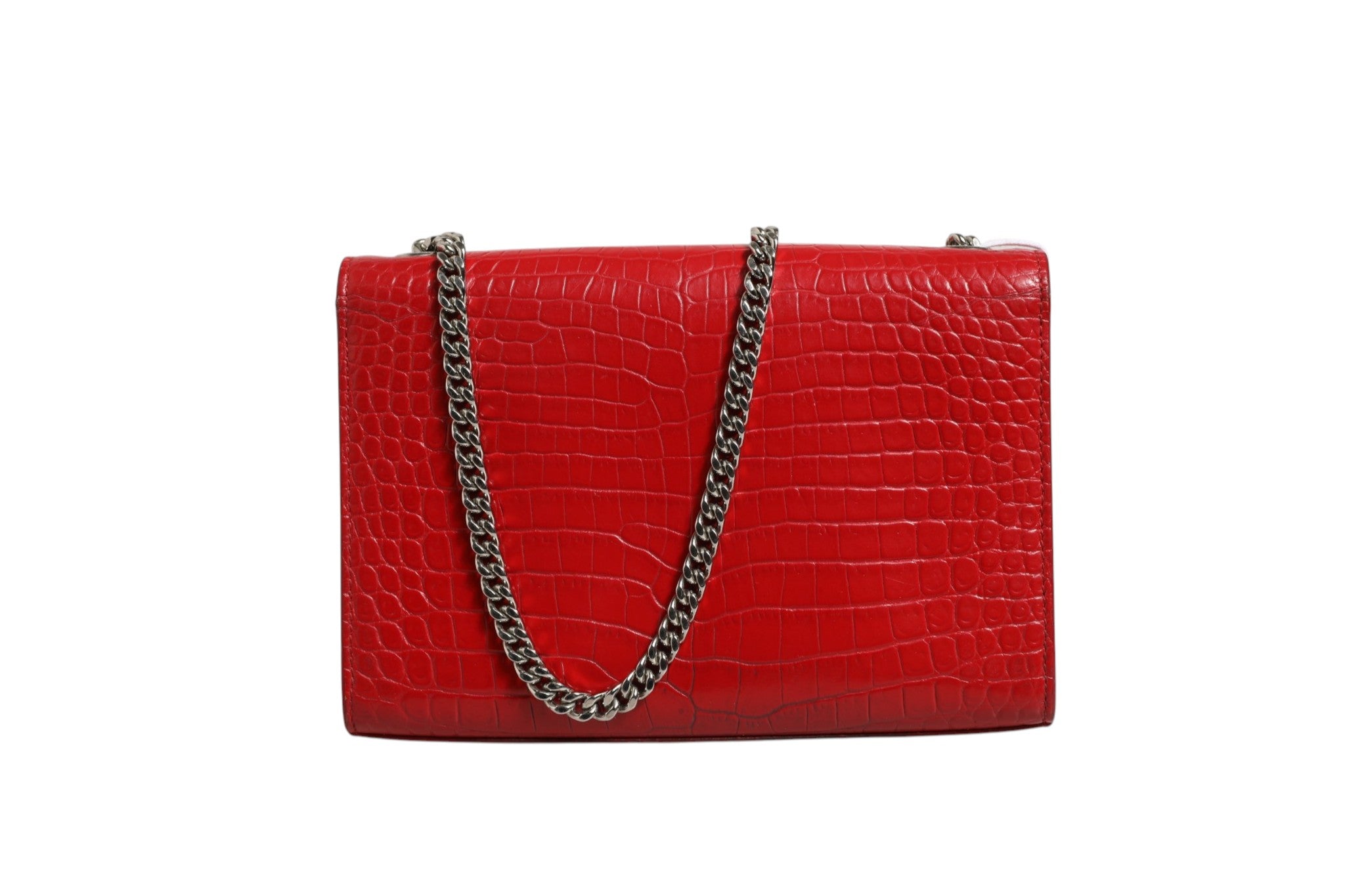 Indulge in the exquisite Saint Laurent Kate Tassel Chain Bag, crafted from luxurious red crocodile embossed leather, a timeless statement of elegance and sophistication.