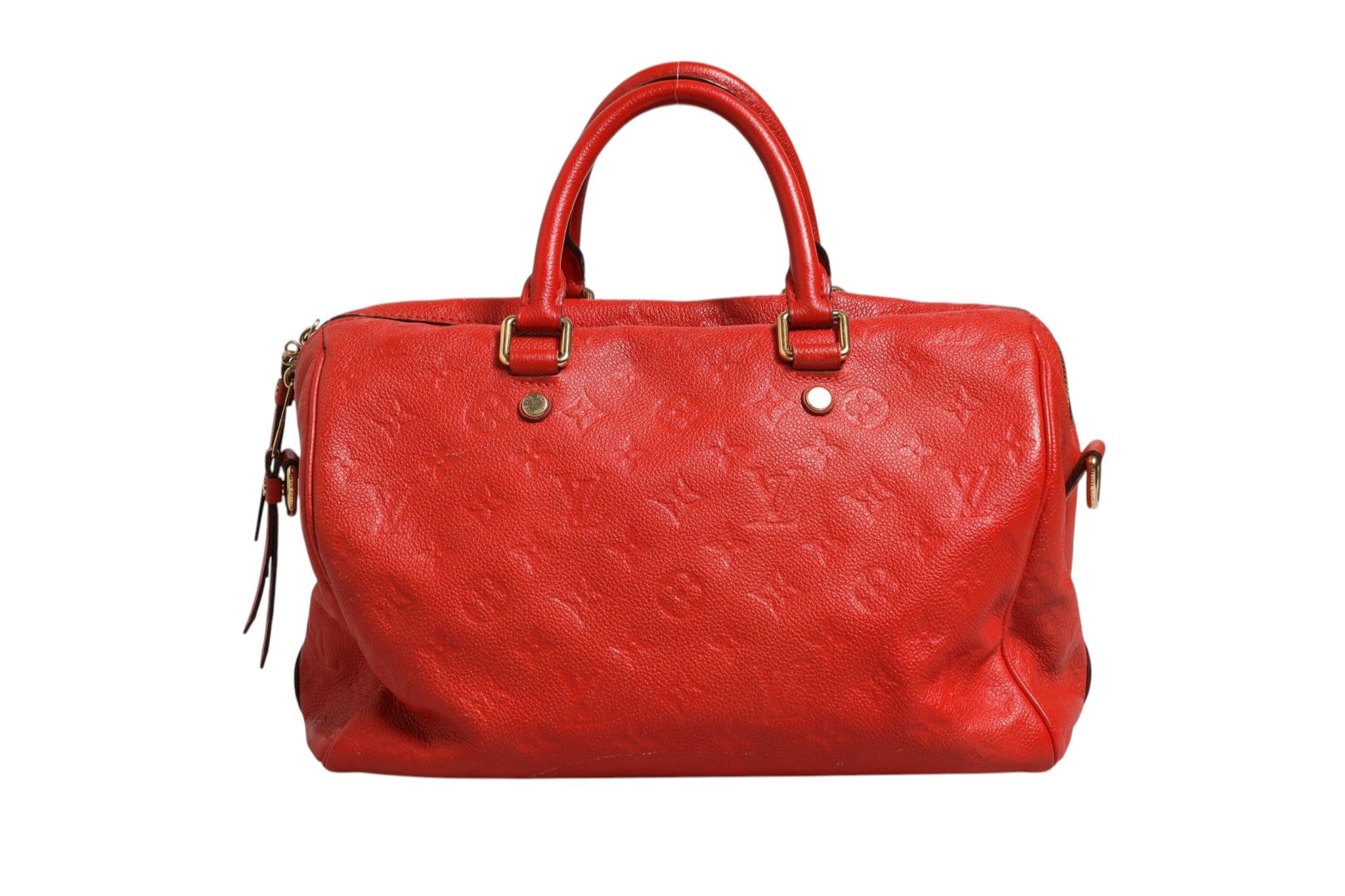 Indulge in the exquisite Louis Vuitton Red Monogram Empreinte Speedy Bandouliere 30, a timeless embodiment of luxury and sophistication, perfect for discerning tastes.