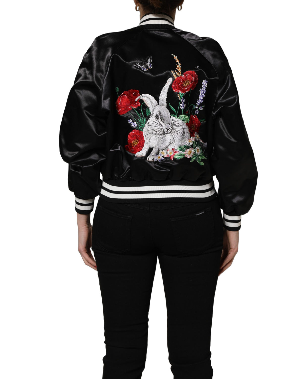 Discover the Dolce & Gabbana Black Satin Floral Embroidery Bomber Jacket, a masterpiece of Italian craftsmanship that fuses sporty elegance with timeless luxury for every occasion.