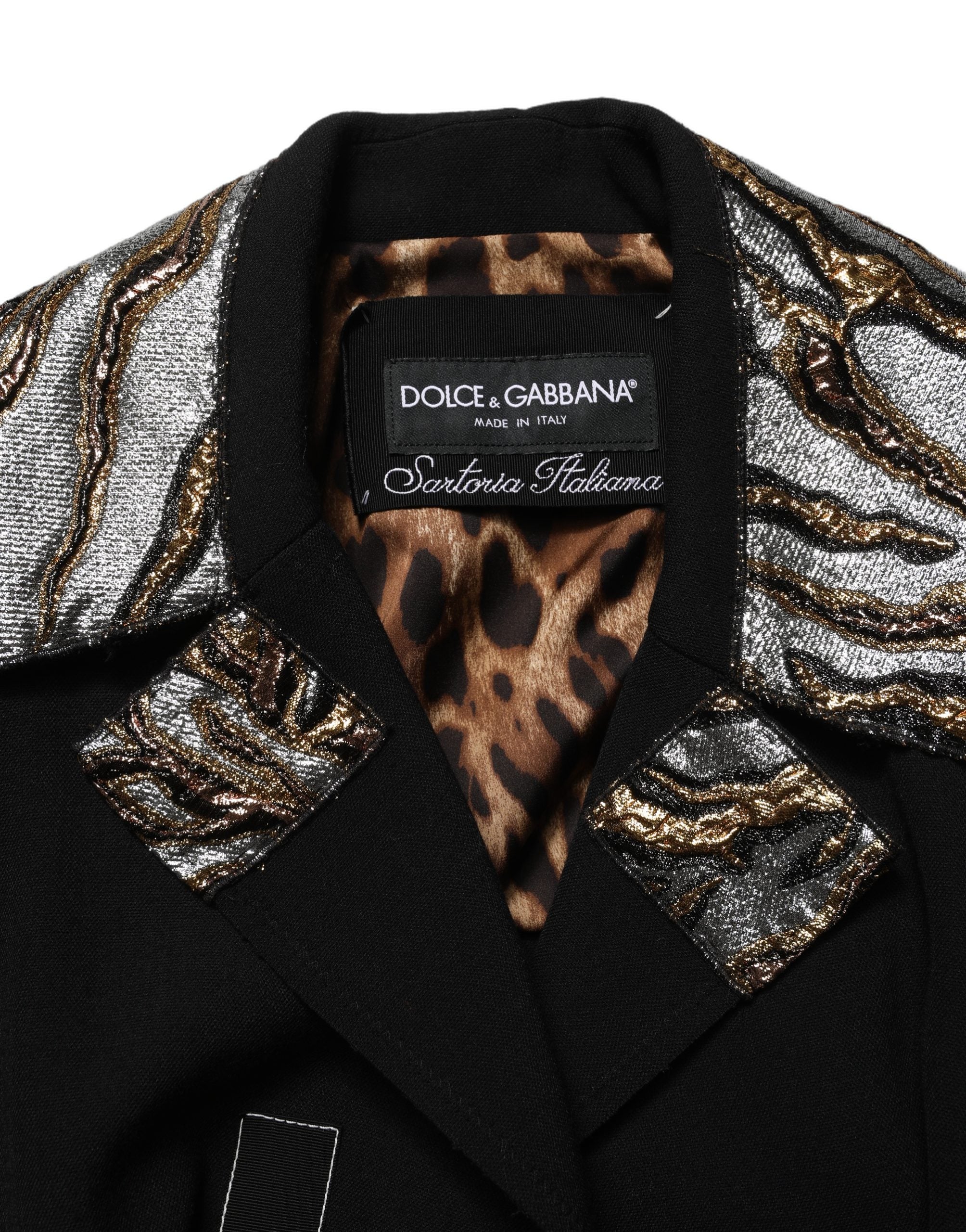Experience the allure of the Dolce & Gabbana Black Single-Breasted Brocade Coat, a timeless masterpiece crafted from luxurious materials, embodying elegance and sophistication.