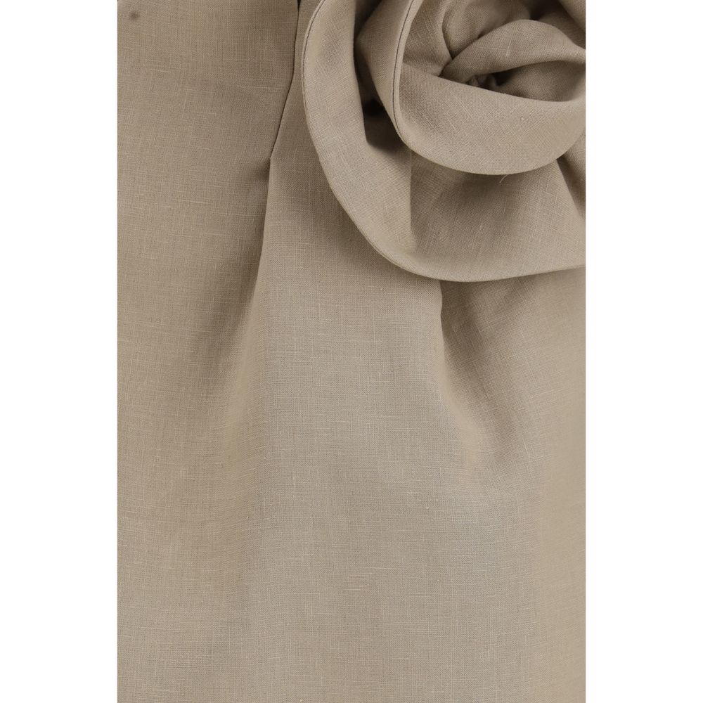 Indulge in the exquisite Magda Butrym Beige Linen Mini Skirt, a masterpiece of romantic sophistication, crafted from premium linen for timeless elegance and unparalleled comfort.
