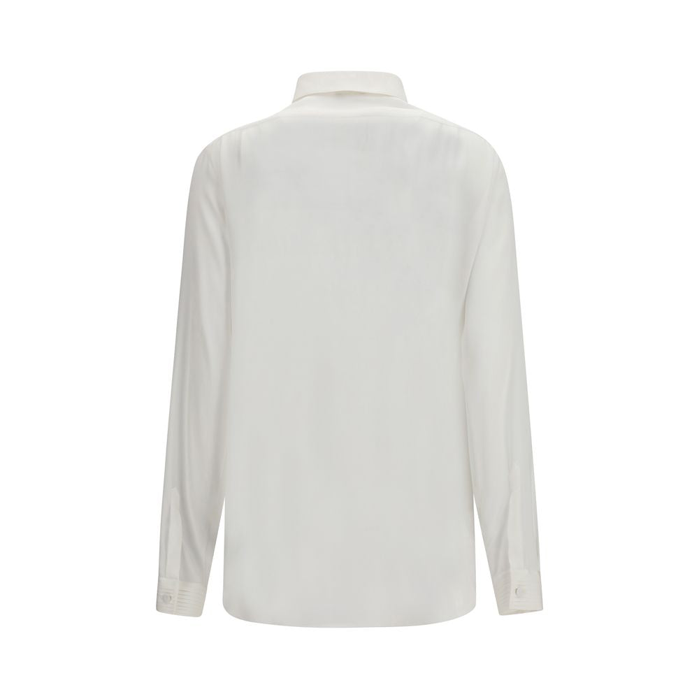 Experience the allure of the Tom Ford White Silk Dress Shirt, crafted from sumptuous silk for timeless elegance, perfect for high-profile occasions and refined style.