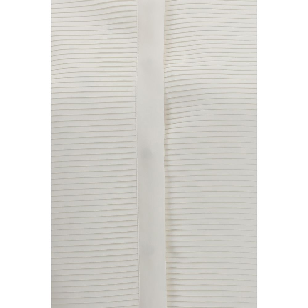 Experience the epitome of sophistication with the Tom Ford White Silk Dress Shirt, crafted from sumptuous silk for timeless elegance, perfect for high-profile occasions.