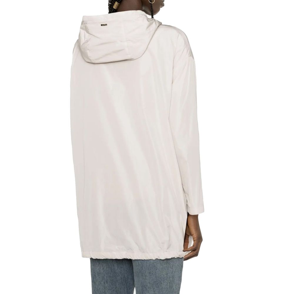 Indulge in the exquisite Herno White Polyester Coat, a testament to Italian craftsmanship, blending elegance and functionality for the discerning connoisseur.