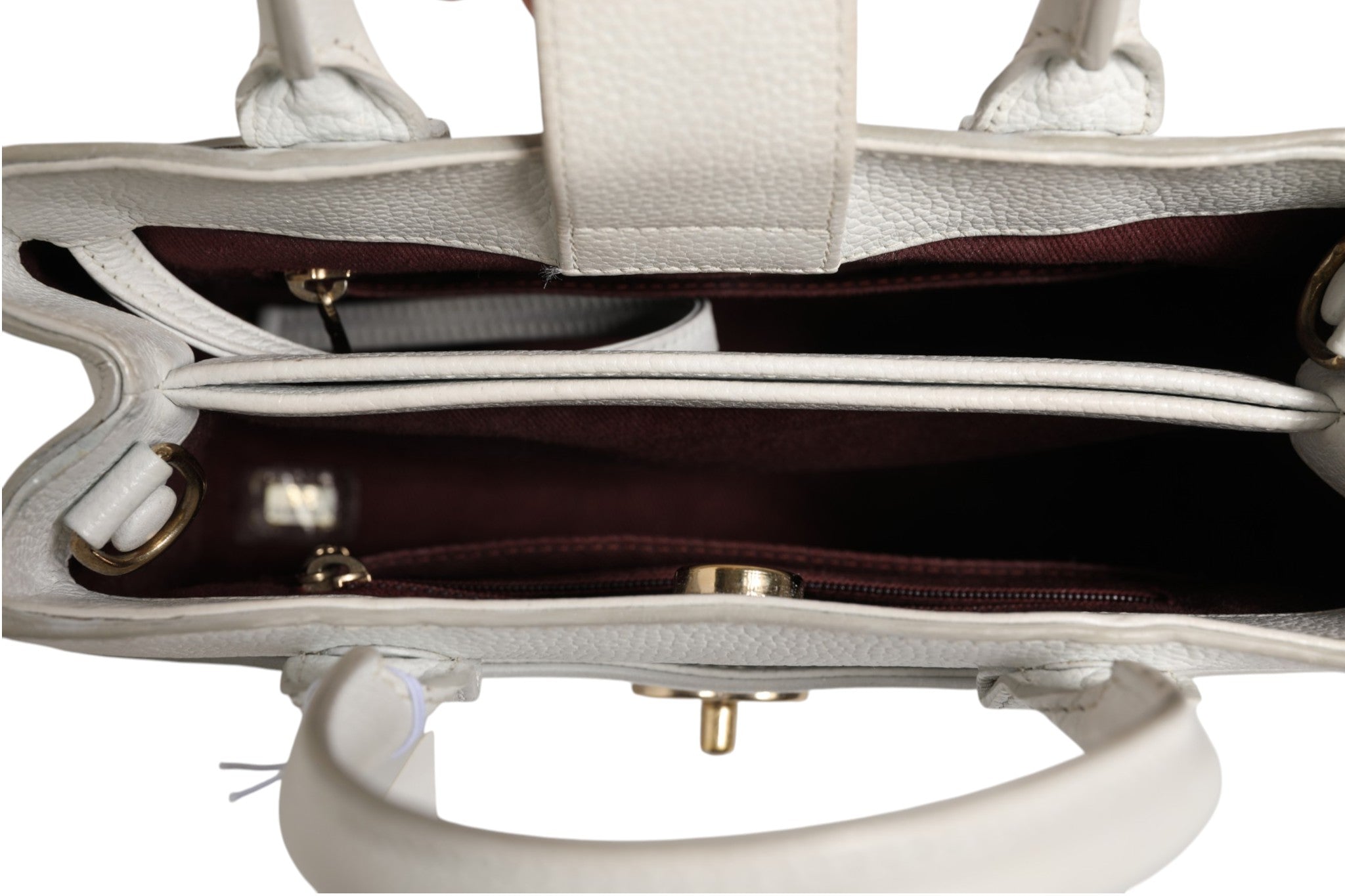 Elevate your style with the Chanel Neo Executive Tote, a symbol of timeless elegance and exquisite craftsmanship, perfect for the discerning individual.