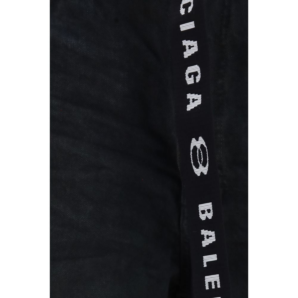 Discover the Balenciaga Black Cotton Bermuda Shorts, a luxurious blend of Japanese cotton denim and urban sophistication, perfect for the discerning fashion connoisseur.