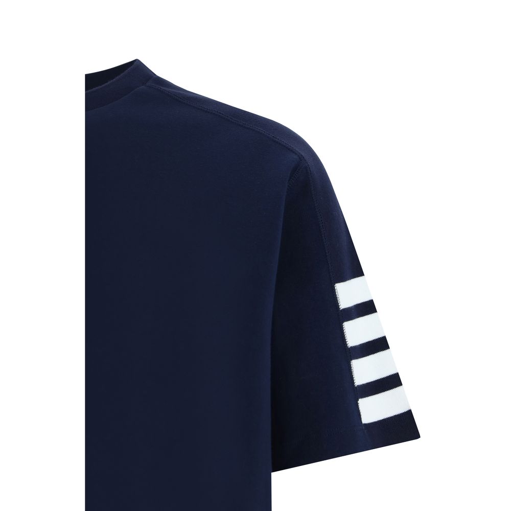Elevate your wardrobe with the Thom Browne Blue Cotton T-Shirt, a luxurious blend of comfort and sophistication, perfect for those who embrace refined elegance.