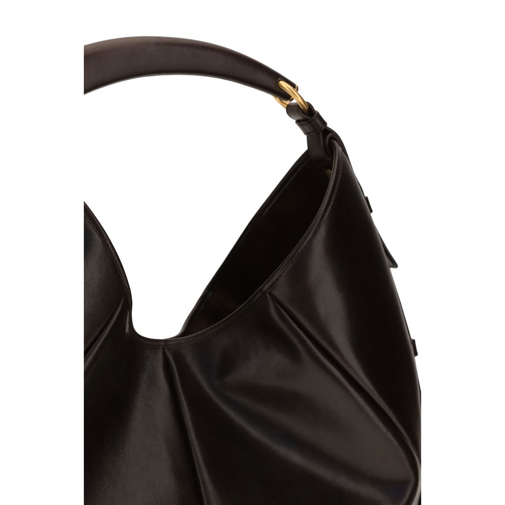 Discover the Saint Laurent Brown Calf Leather Bos Taurus Shoulder Bag, a masterpiece of exquisite craftsmanship and luxurious materials, perfect for elevating any ensemble.