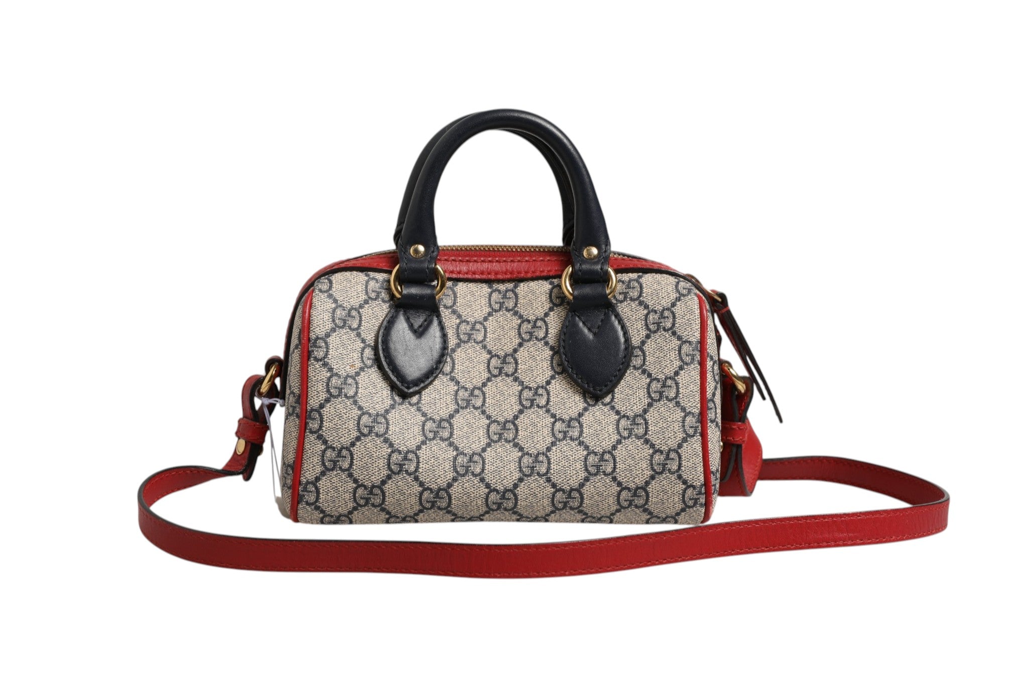 Indulge in the exquisite allure of the Gucci GG Supreme Mini Boston Bag, a timeless fusion of luxury and artistry, perfect for the discerning fashion aficionado.