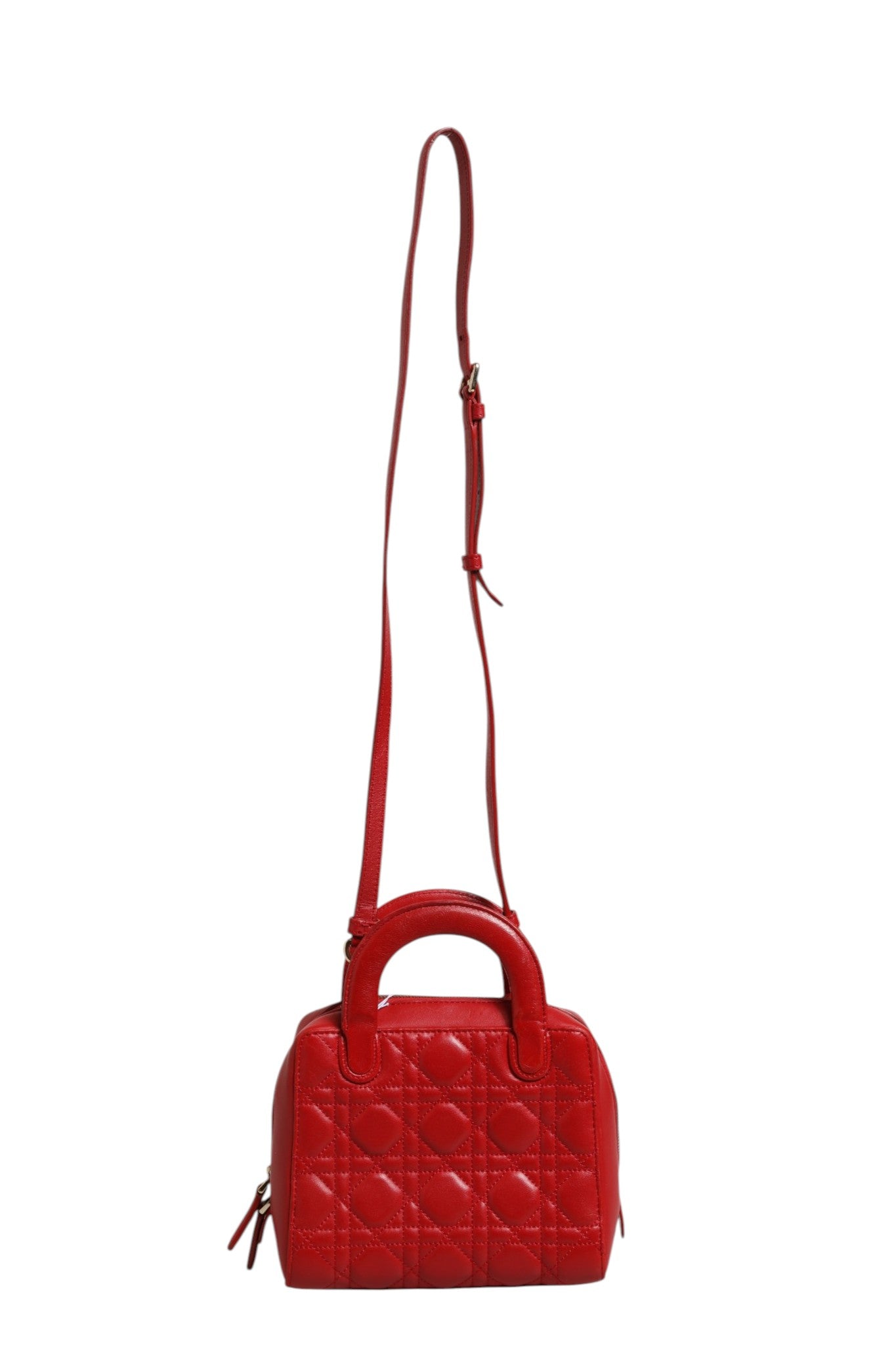 Indulge in the exquisite allure of the Christian Dior Small Dior Toujours Bag, crafted from luxurious black Macrocannage calfskin, a timeless emblem of sophistication and artistry.