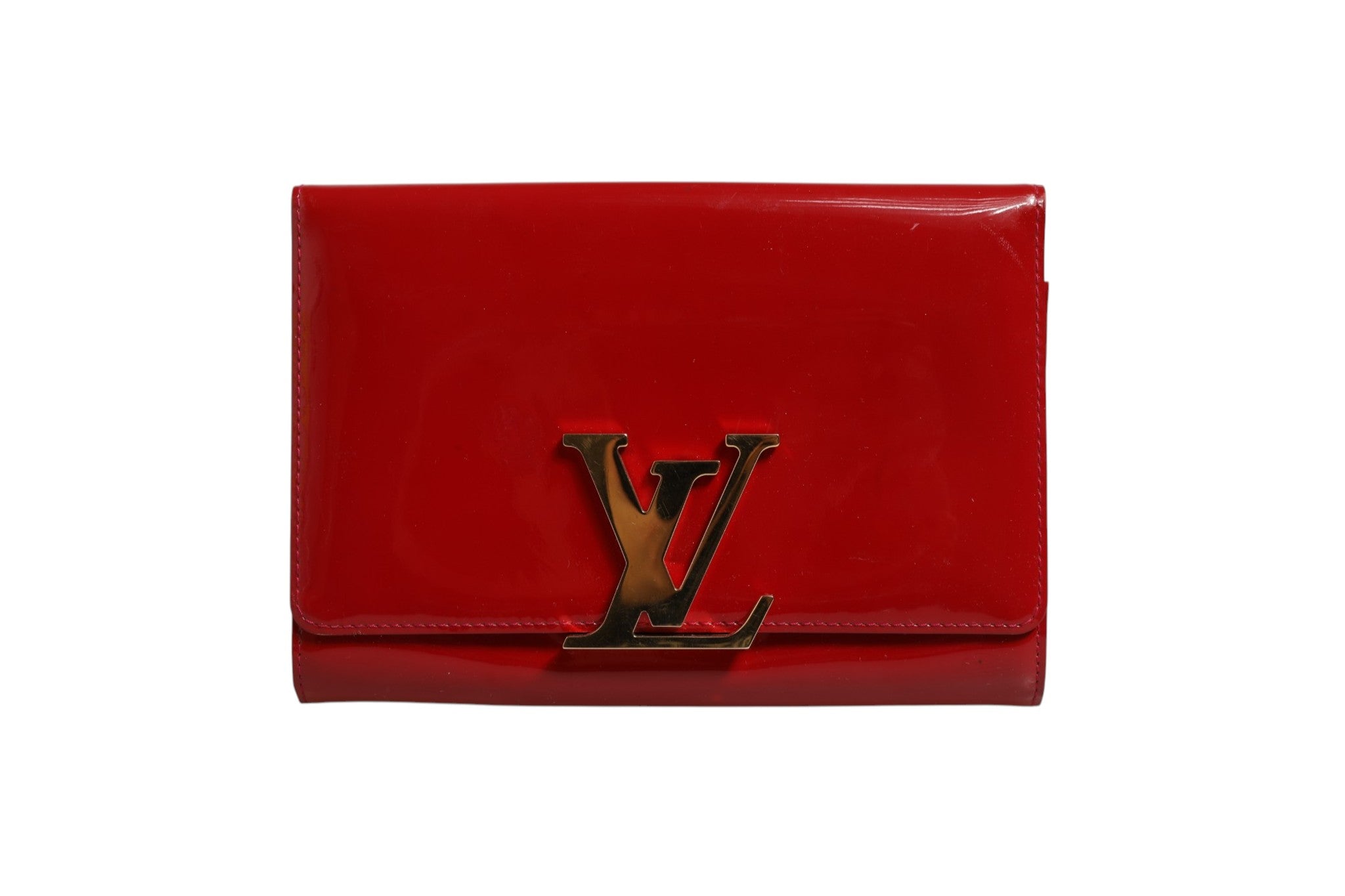 Indulge in the elegance of the Louis Vuitton Louise PM Red Patent Leather Wallet On Chain, a masterpiece of luxury craftsmanship that embodies sophistication and timeless allure.