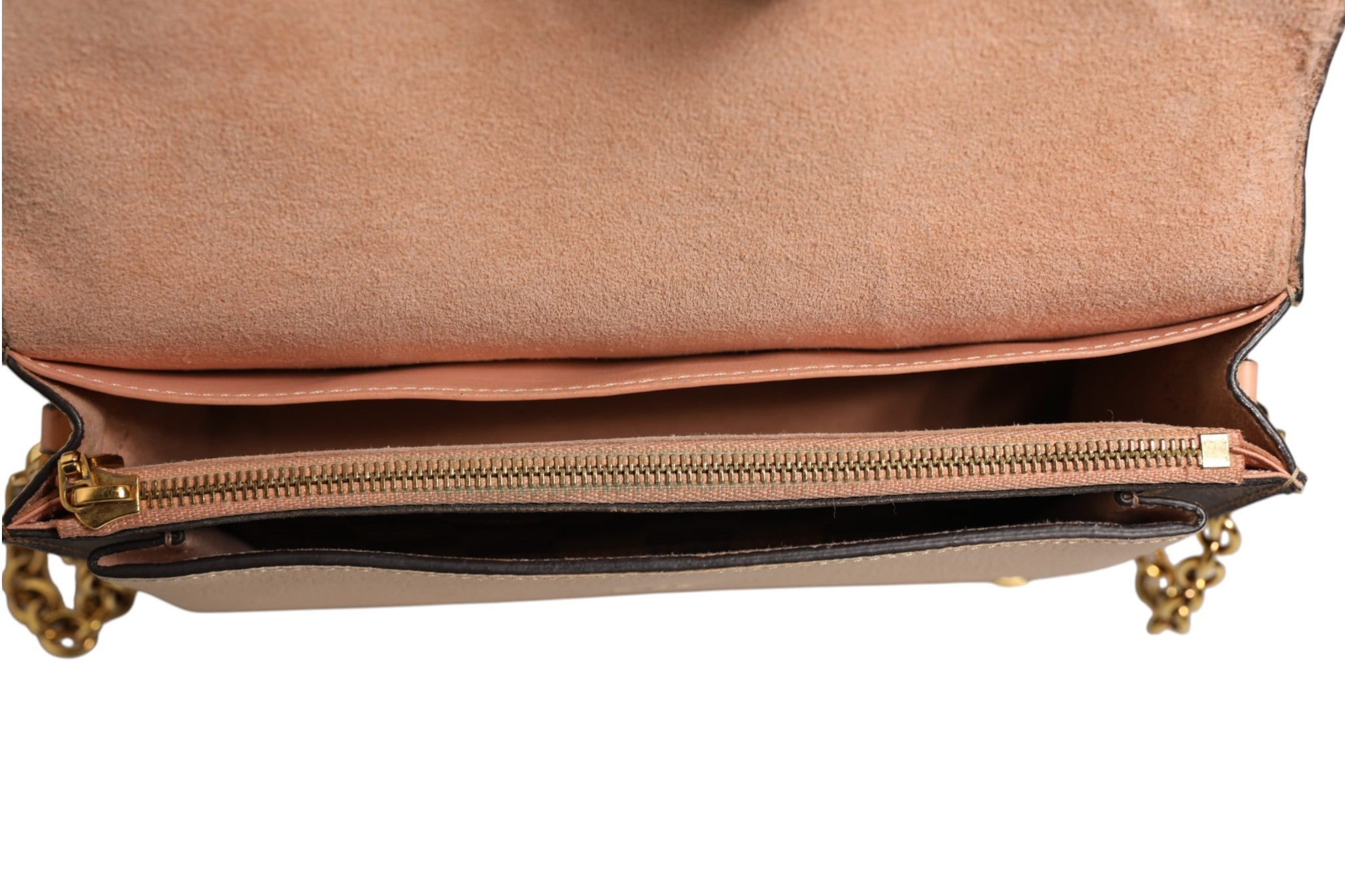 Indulge in the timeless elegance of the Louis Vuitton Damier Ebene Vavin Chain Wallet, where exquisite craftsmanship meets sophisticated design, perfect for any occasion.