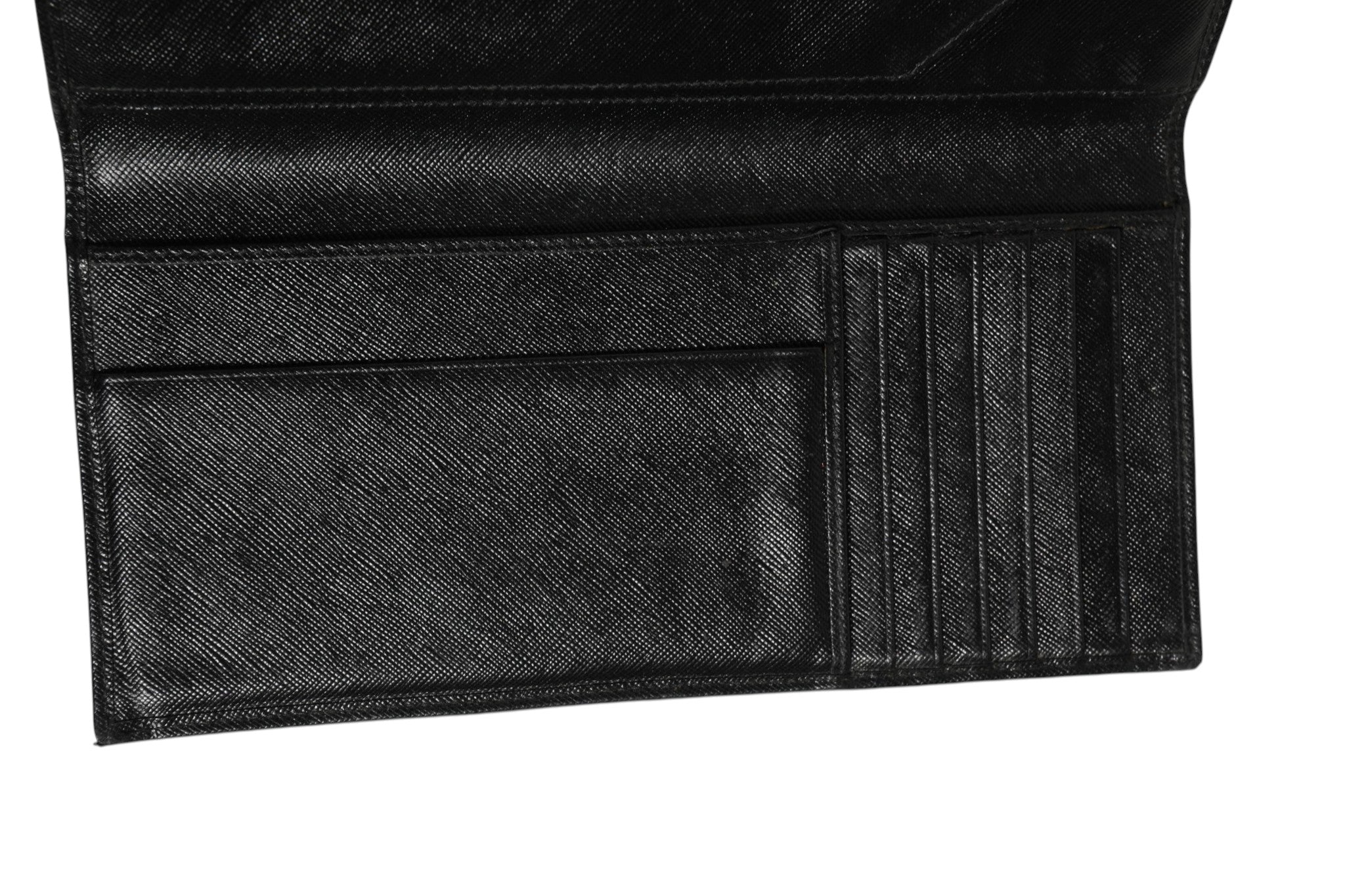 Discover the Prada Saffiano Leather Slim Card Holder Wallet, a testament to exquisite craftsmanship and timeless elegance, perfect for the discerning individual.