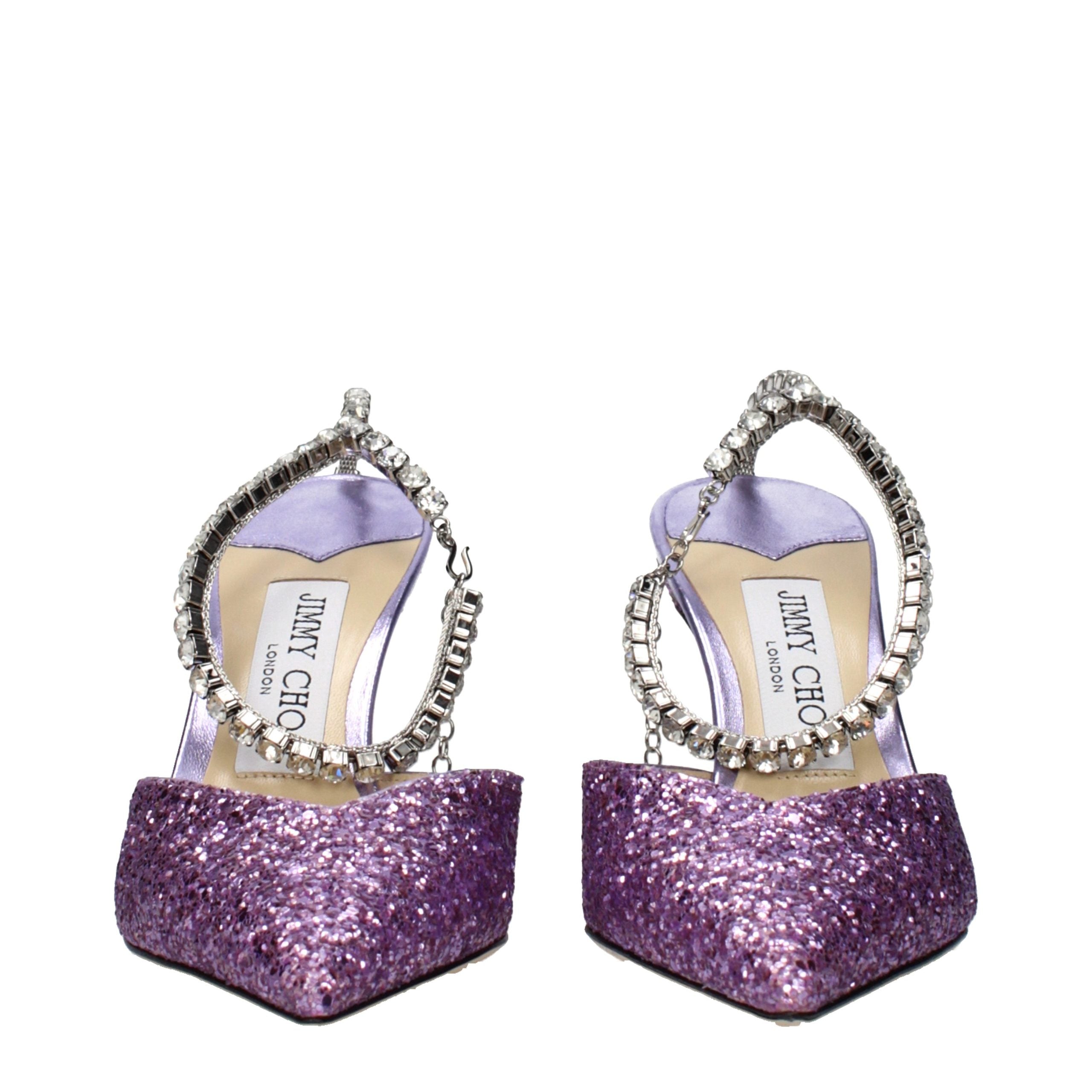 Step into the allure of Jimmy Choo Purple Plastic Stiletto Heel Sandals, where exquisite craftsmanship meets a captivating glitter finish, embodying luxury and sophistication.